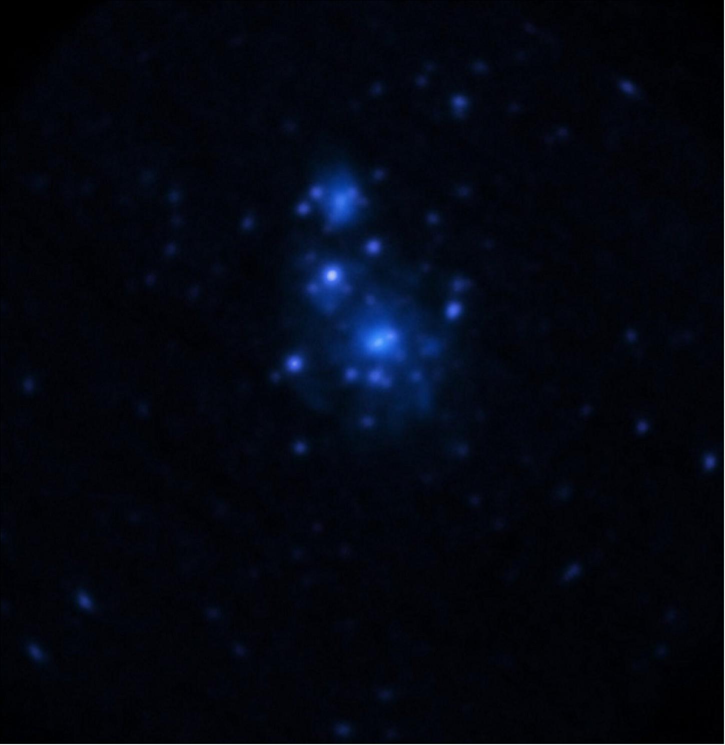 Figure 17: XMM-Newton's X-ray view of the Whirlpool Galaxy (M51). The Whirlpool Galaxy, is one of the most spectacular examples of a spiral galaxy. With two spiral arms curling into one another in a billowing swirl, this galaxy hosts over a hundred billion stars and is currently merging with its companion, the smaller galaxy NGC 5195 (image credit: ESA)