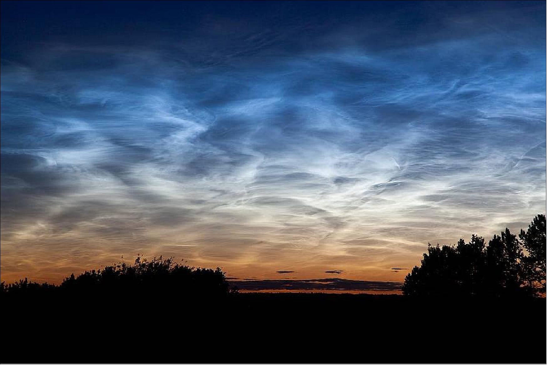 Figure 7: Noctilucent clouds appeared in the sky above Edmonton, Alberta, in Canada on July 2, 2011 (image credits: NASA/Dave Hughes)