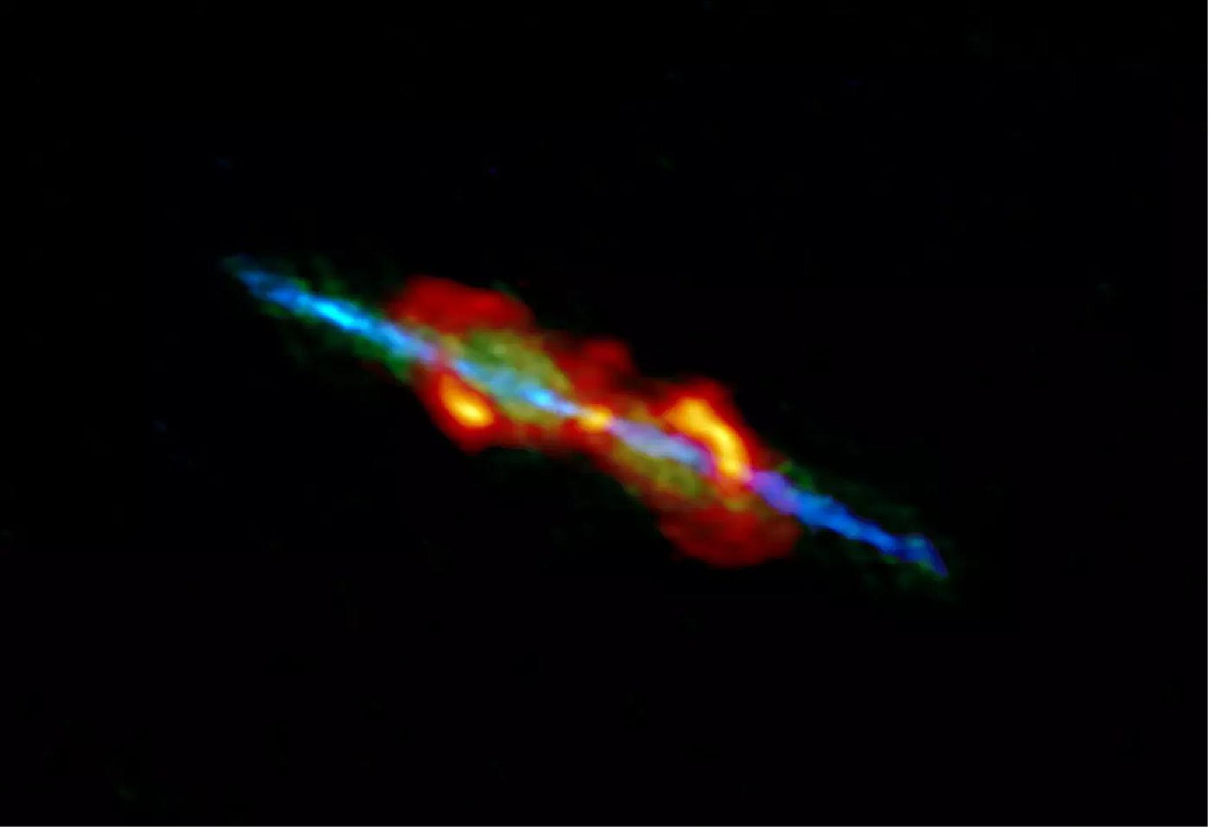 Figure 67: ALMA image of the old star system W43A. The high velocity bipolar jets ejected from the central aged star are seen in blue, low velocity outflow is shown in green, and dusty clouds entrained by the jets are shown in orange (image credit: ALMA (ESO/NAOJ/NRAO), Tafoya et al.)