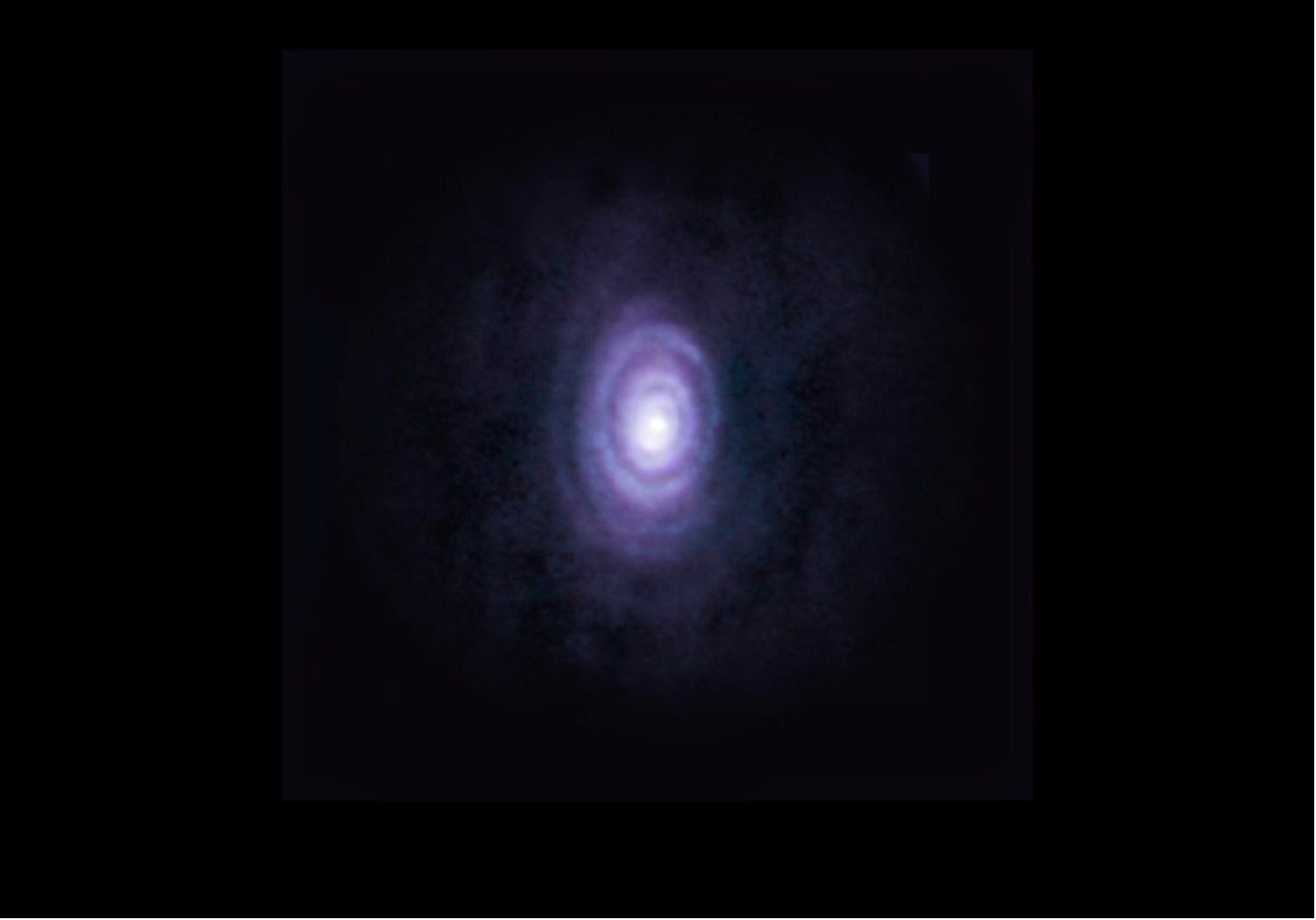 Figure 27: The carbon-rich star V Hydrae is in its final act, and so far, its death has proved magnificent and violent. Scientists studying the star have discovered six outflowing rings (shown here in composite), and other structures created by the explosive mass ejection of matter into space [image credit: ALMA (ESO/NAOJ/NRAO)/S. Dagnello (NRAO/AUI/NSF)]