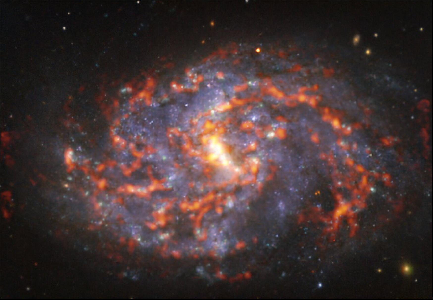 Figure 20: This image was taken as part of the Physics at High Angular resolution in Nearby GalaxieS (PHANGS) project. The team is making high-resolution observations of nearby galaxies with telescopes operating across a wide range of wavelengths. Different wavelengths tell us about the physical properties of stars, gas and dust within galaxies, and by comparing them astronomers are able to study what activates, boosts or hinders the birth of new stars (image credit: ESO/ALMA (ESO/NAOJ/NRAO)/PHANGS)