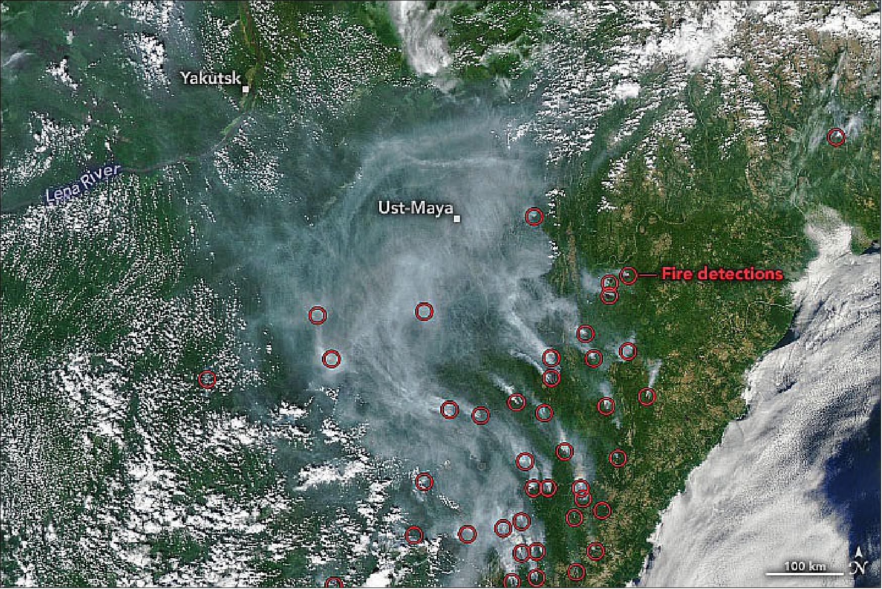 Figure 5: The MODIS instrument on NASA’s Aqua satellite captured this natural-color image of smoke swirling over the region on July 17, 2022. The image has been overlaid with red circles indicating locations where MODIS detected heat signatures indicative of fire. Many of the fires were burning in the Ayano-Maysky district of Khabarovsk, which is home to larch forests and the circular Kondyor massif (image credit: NASA Earth Observatory image by Joshua Stevens, using MODIS data from NASA EOSDIS LANCE and GIBS/Worldview, and data from the Fire Information for Resource Management System (FIRMS). Story by Adam Voiland)
