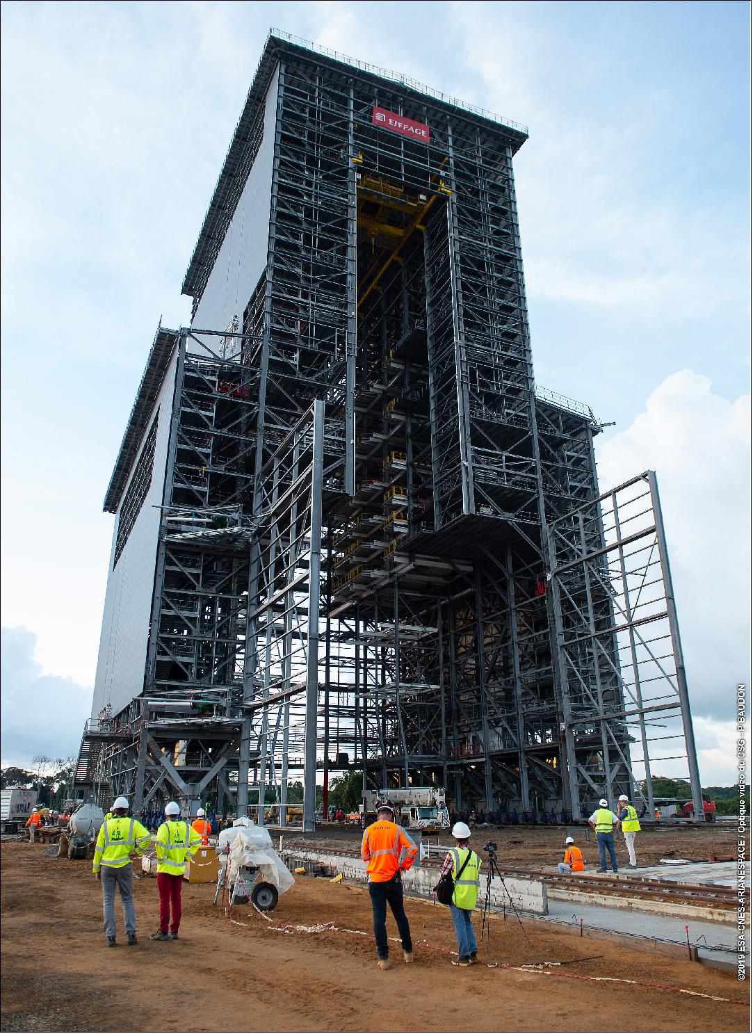 Figure 68: The mobile gantry, a 90 m high 8,200 ton metallic structure stands on 16 bogies that move this colossal structure. It houses Ariane 6 until it is retracted about five hours before launch (image credit: ESA)