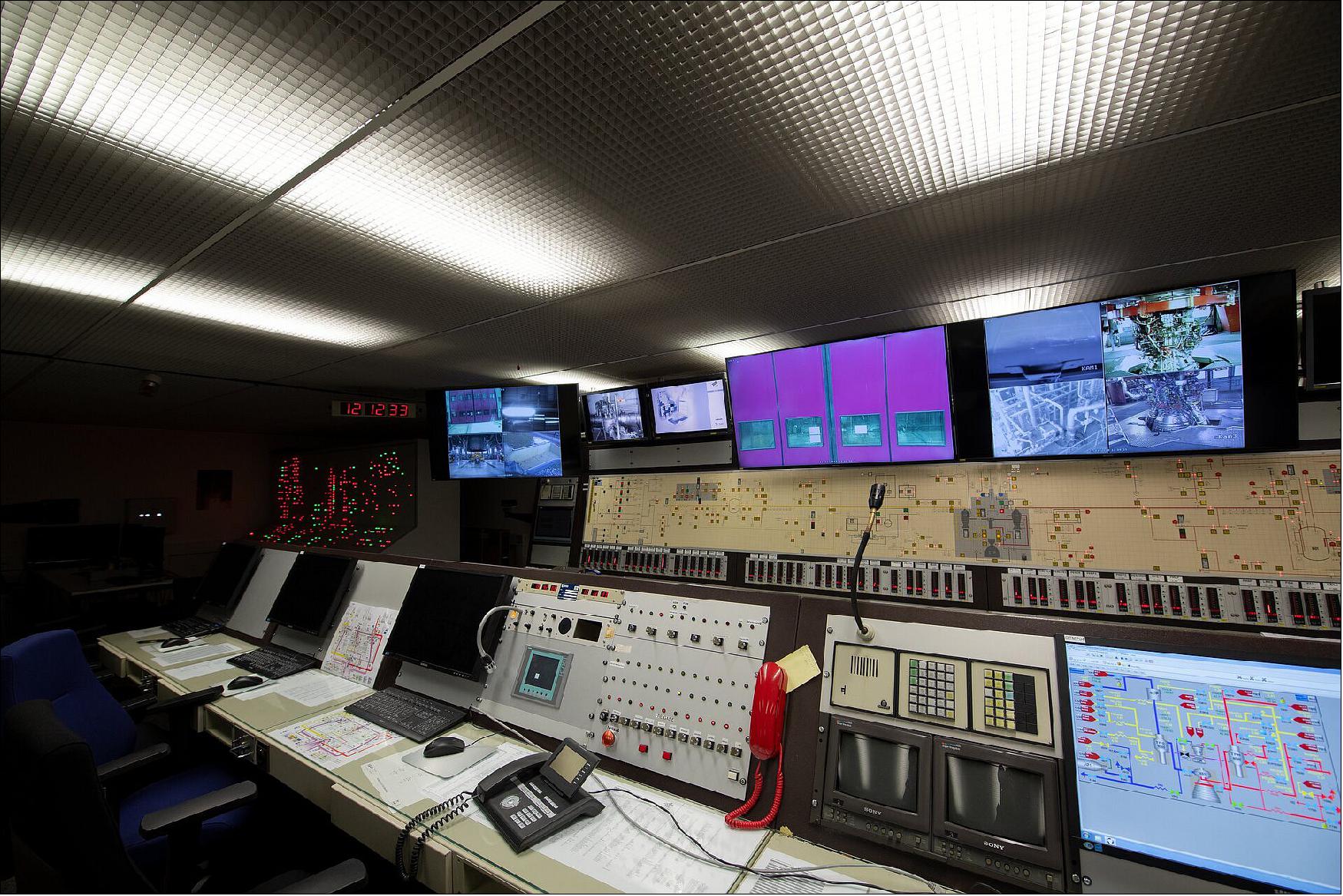 Figure 45: On 26 February 2019, the DLR German Aerospace Center in Lampoldshausen inaugurated a new test facility that simulates launch for the complete Ariane 6 upper stage. Operations inside the test stand are monitored from a central control room located away from the test stand. After final preparations, a countdown marks the start of the test, simulating an actual rocket launch. The tests will include the Vinci engine firing, non-propulsive ballistic phases, tank pressurization to increase performance, Vinci re-ignitions, exhaust nozzle maneuvers, ending with passivation where all remaining internal energy is removed (image credit: ESA, S. Corvaya)