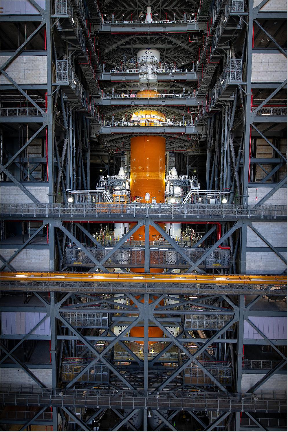 Figure 5: Orion integration on top of Moon launcher. The European Service Module that will power the first Orion uncrewed flight, ESM-1, was lifted up and mated with the rocket in preparation for launch, together with the crew module. Integration began on 20 October 2021, and the spacecraft was secured atop the powerful rocket six days later (image credit: ESA, S. Corvaja)
