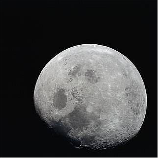 Figure 30: This photograph of a nearly full Moon was taken from the Apollo 8 spacecraft at a point above 70 degrees east longitude. Mare Crisium, the circular, dark-colored area near the center, is near the eastern edge of the Moon as viewed from Earth (image credit: NASA)