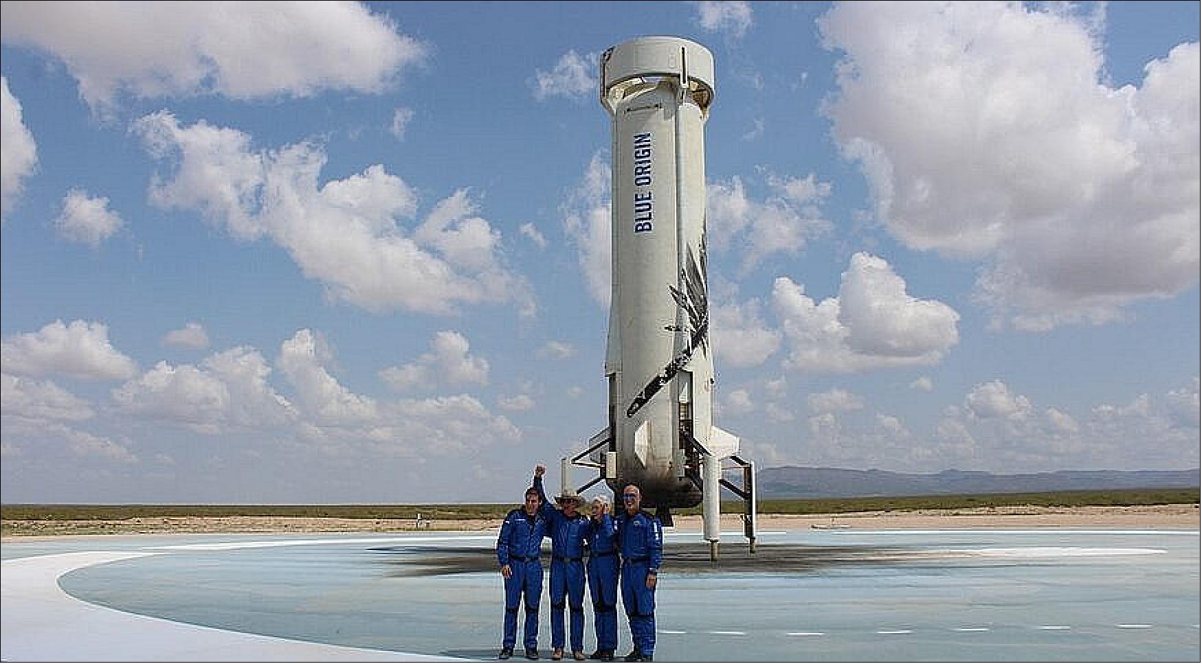 Figure 17: The NS-16 crew poses in front of the booster that launched their mission. From left: Oliver Daemen, Jeff Bezos, Wally Funk and Mark Bezos (image credit: SpaceNews/Jeff Foust)