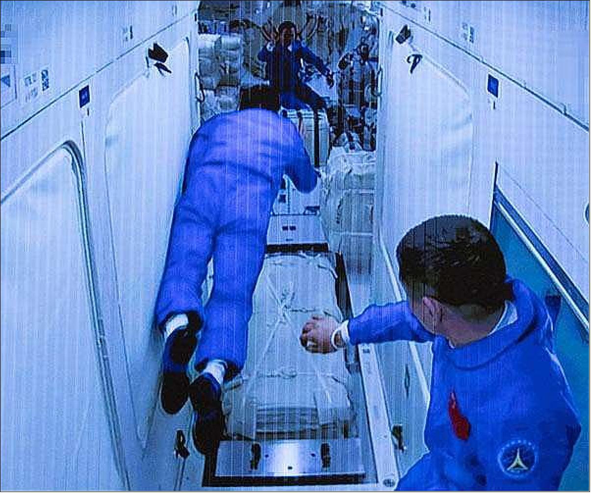 Figure 36: Astronauts enter the core module of China's space station from the Shenzhou-12 spacecraft on June 17, 2021. The crew have started to prepare their orbiting residence for operations for the next three months (photo credit: Xinhua)