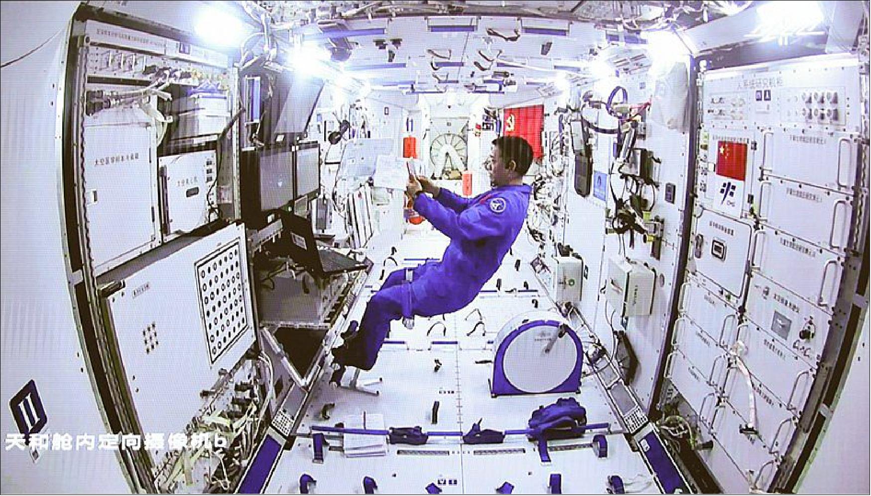 Figure 31: Chinese astronaut Nie Haisheng works inside the Tianhe module (image credit: Jin Liwang/Xinhua/eyevine)