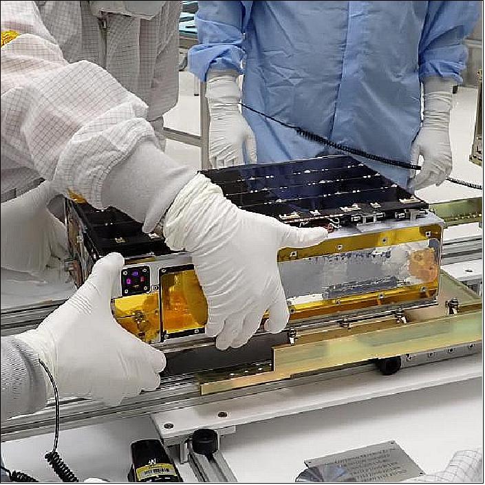 Figure 2: LASP researchers working on CTIM at the University of Colorado, Boulder. About the size of a shoebox, CTIM is the smallest instrument ever dispatched to study total solar irradiance (image credit: Tim Hellickson / University of Colorado, Boulder)