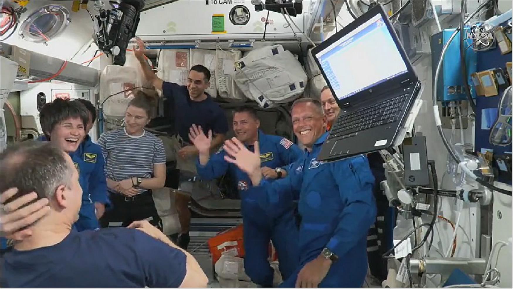 Figure 24: Crew-4 NASA astronauts Mission Commander Kjell Lindgren, Pilot Bob Hines, and Mission Specialist Jessica Watkins, and Mission Specialist Samantha Cristoforetti of ESA (European Space Agency) were greeted by Crew-3 as they arrived to the International Space Station (image credit: NASA TV)