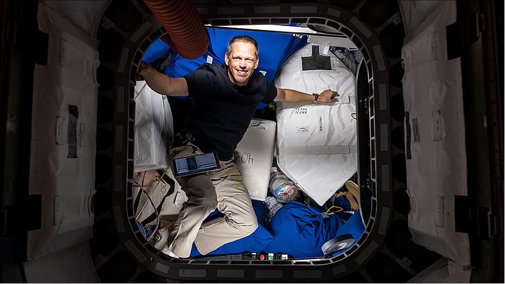 Figure 14: NASA astronaut and Expedition 67 Flight Engineer Bob Hines is pictured during cargo operations and inventory tasks inside the Cygnus space freighter from Northrop Grumman (image credit: NASA TV)