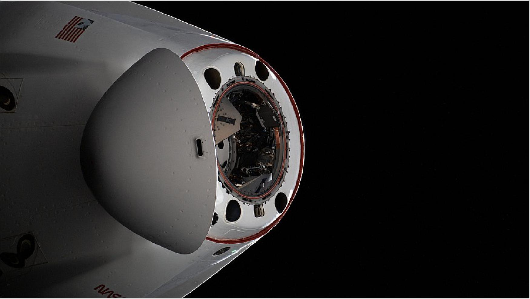 Figure 10: The pressurized capsule of the SpaceX Cargo Dragon resupply ship with its nose cone open is pictured as the vehicle departs the International Space Station on Jan. 23, 2022 (image credit: NASA TV)