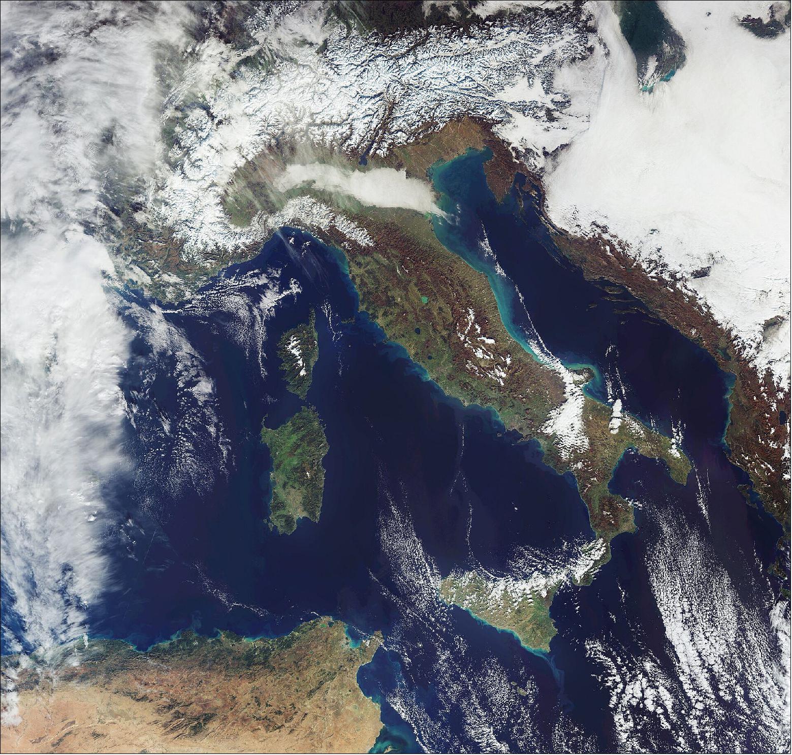 Figure 41: Heavy snowfall in the Alps has been recorded over the past weeks, with up to 3 m of snow recorded in some parts of the Austrian and Italian Alps. On 14 December, the OLCI (Ocean and Land Color Instrument) onboard the Sentinel-3 mission acquired this image of snow cover and low cloud coverage around the Alps. According to EUMETSAT, the snow came in two bouts. The first occurred during the weekend of 5-6 December and was stronger, influencing the western part of the Alps, while the second, on 8 and 9 December, brought snow to central and eastern Alps, and was not as abundant as the first. The skies then cleared after 10 December, allowing this image to be captured. The first bout of snow lead to road blocks, power outages throughout South Tyrol and avalanche warnings, according to Der Spiegel (image credit: ESA, the image contains modified Copernicus Sentinel data (2020), processed by ESA, CC BY-SA 3.0 IGO)