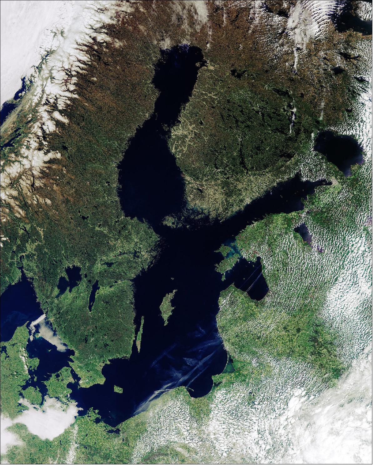 Figure 26: Captured by the Copernicus Sentinel-3 mission on 30 May 2021, this image shows the Baltic Sea and coastlines of the surrounding countries of Denmark, Sweden, Finland, Russia, Estonia, Latvia, Lithuania, Poland, and Germany. Sea-level rise is a major global concern, and using satellites carrying radar altimeters to map sea-level change close to the coast is difficult, especially along complex coastlines such as those seen here. The main problem is because mountains, bays and offshore islands distort the radar signal that is reflected back to the satellite. Another problem is sea ice, which covers parts of the oceans in winter, is impenetrable to radar. However, new research demonstrates how a specific way of processing satellite now makes it possible to determine sea-level change in coastal areas with millimeter per year accuracy, and even if the sea is covered by ice (image credit: ESA, the image contains modified Copernicus Sentinel data (2021), processed by ESA, CC BY-SA 3.0 IGO)