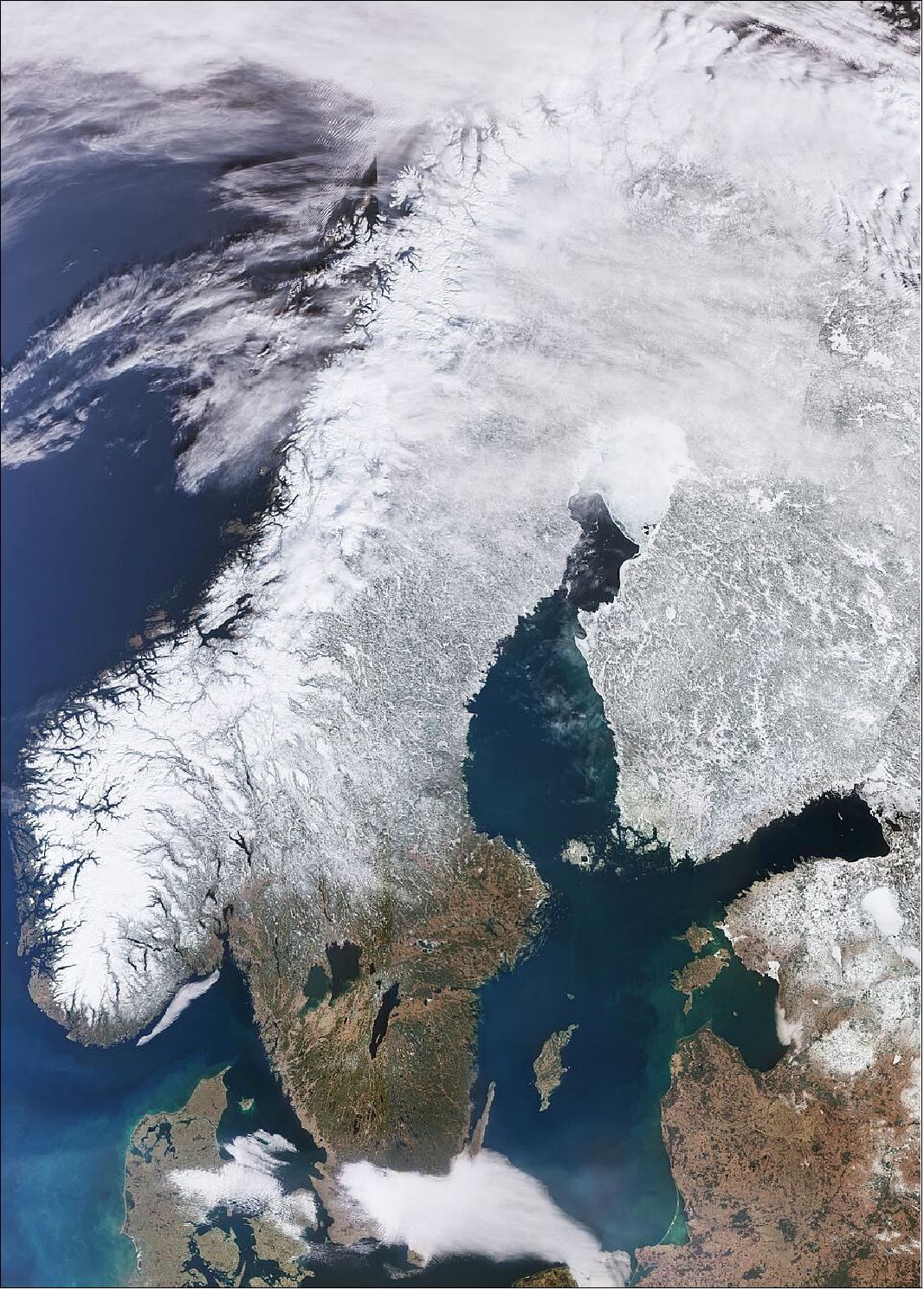 Figure 20: The Copernicus Sentinel-3 mission captured this impressive shot of the almost cloud-free Scandinavian Peninsula on 20 March, 2022. The image is a mosaic of 2 descending orbits with a difference of around 60 minutes between them, hence the observable striping at the top of the image. The image is also featured on the Earth from Space video programme (image credit: ESA)