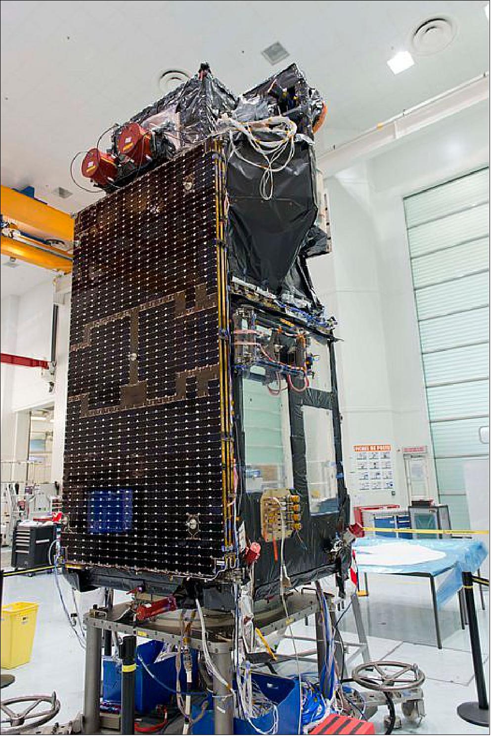 Figure 6: Photo of the Sentinel-3A spacecraft in the cleanroom of Thales Alenia Space in Cannes, France with the solar wings attached (image credit: ESA, A. Le Floc’h) 20)