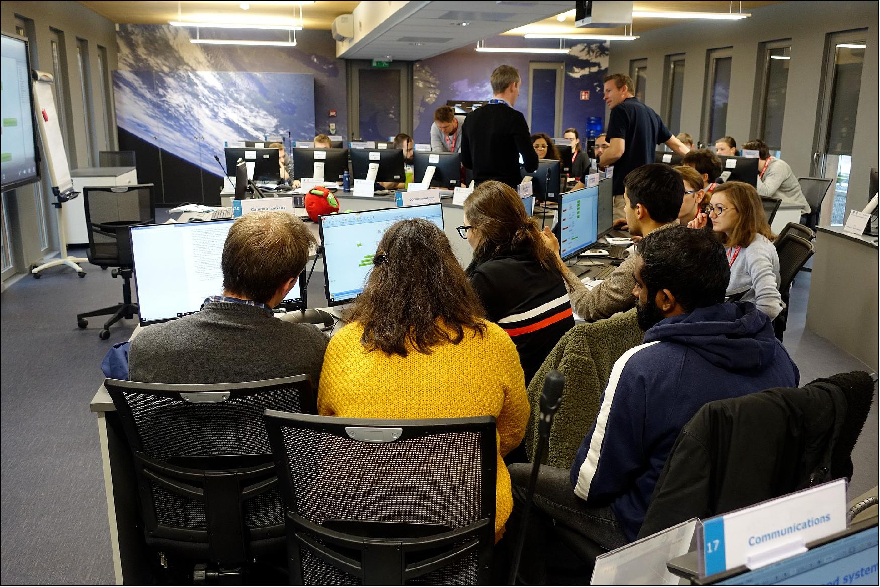 Figure 52: Real time in person dialogue between the different disciplines is a vital part of the Concurrent Engineering approach (image credit: ESA)