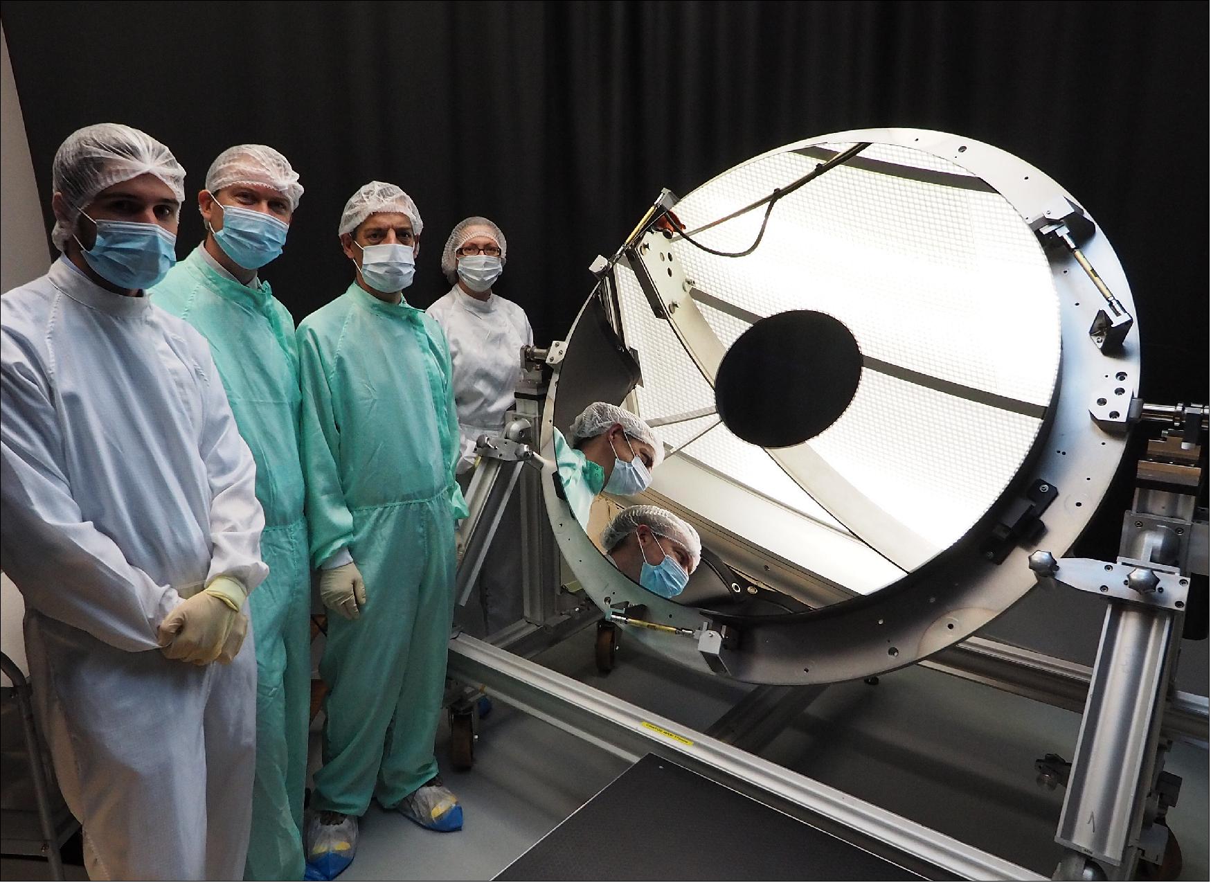 Figure 40: The primary mirror (M1) of the Euclid telescope, together with representatives of Safran Reosc, the mirror manufacturer, and Airbus Defence and Space, in charge of developing the spacecraft’s payload module, including the telescope (image credit: Safran Resoc)