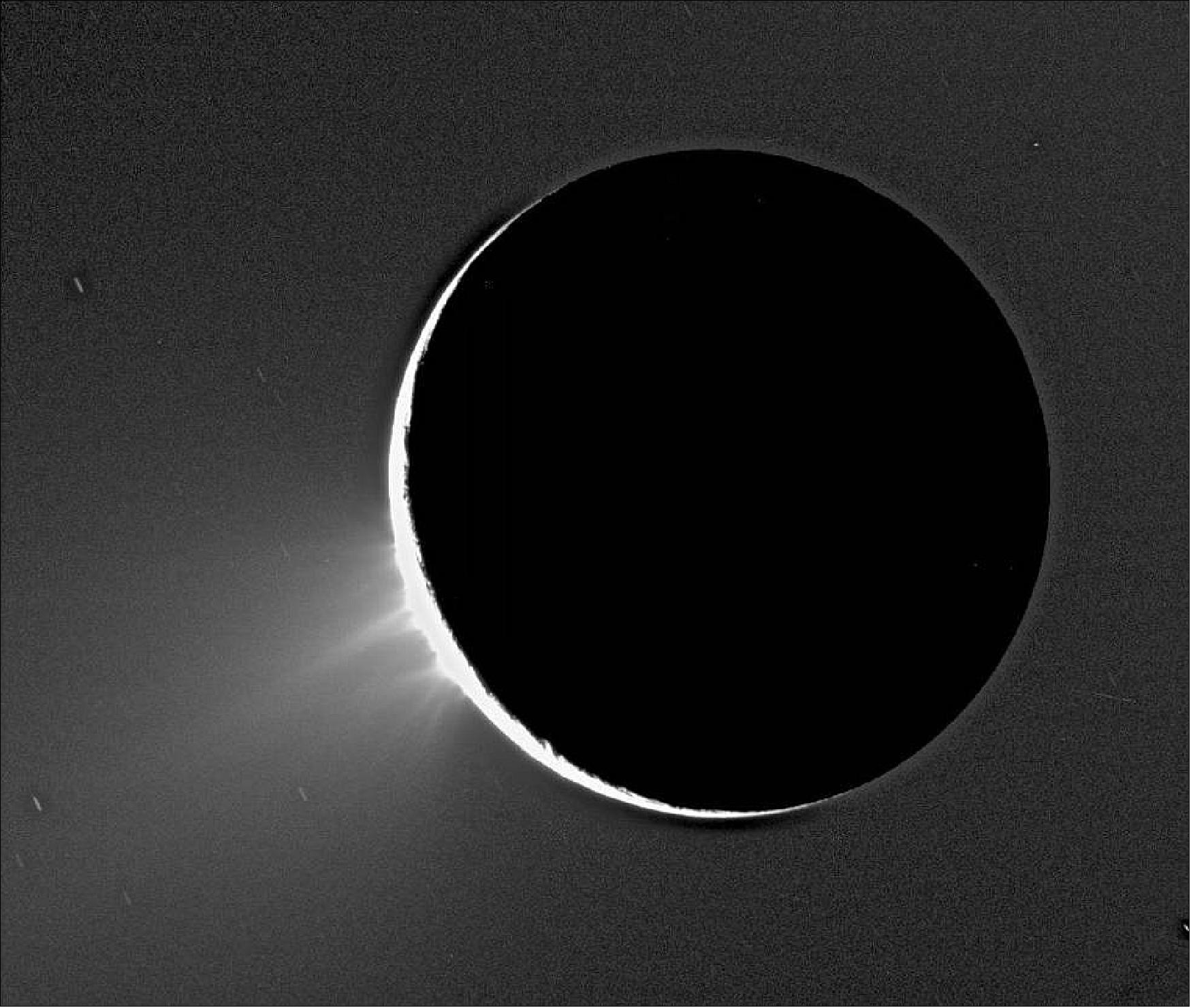 Figure 13: One of the first images of Enceladus' water jets taken by NASA's Cassini spacecraft on Nov. 27, 2005. In this image, Enceladus is backlit by the Sun (image credits: NASA/JPL/Space Science Institute)