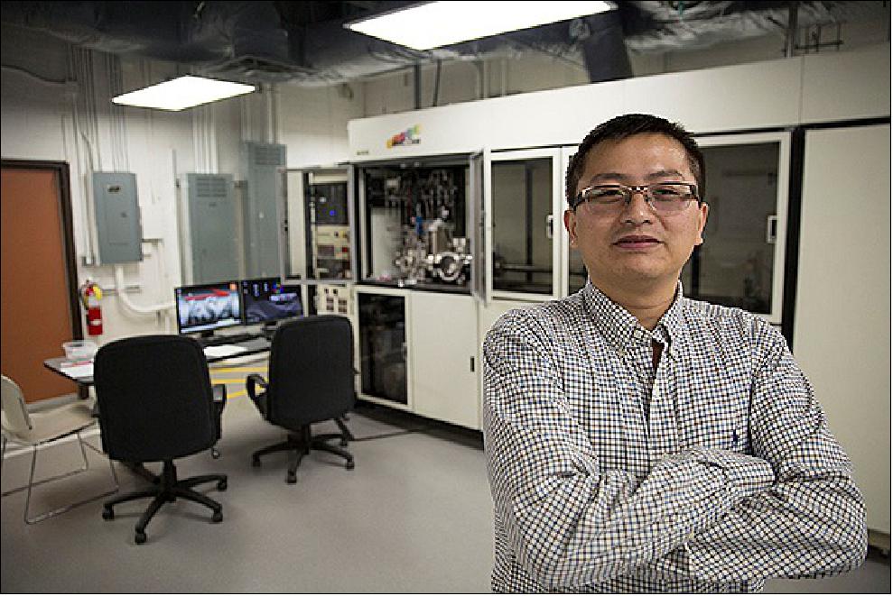 Figure 10: Yuji Zhao stands in his Metal-Organic Chemical Vapor Deposition lab on the Tempe campus, where he works with gallium nitride (photo credit: Pete Zrioka/ASU)