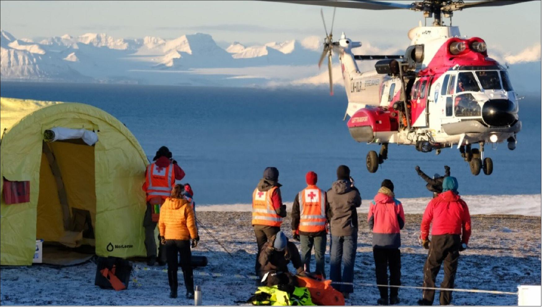 Figure 98: Arctic practice rescue guided by emergency beacon. Arctic Mass Rescue Operation organised by Norwegian authorities in October 2021, just a few km off Svalbard. A Galileo-enabled EPIRB compatible with the Return Link Service was used (image credit: EUSPA)