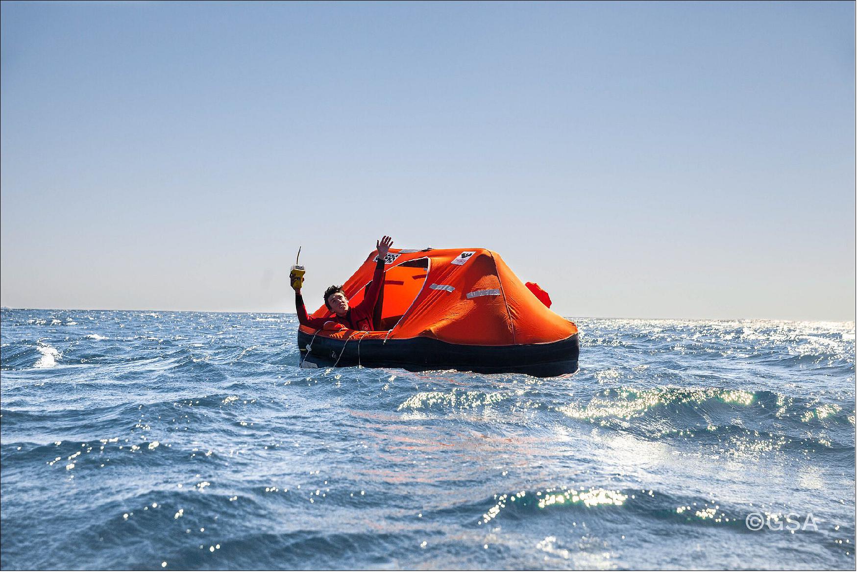 Figure 36: Stranded sailors in liftraft use an emergency position-indicating radiobeacon (EPIRB) to call for help (image credit: GSA)