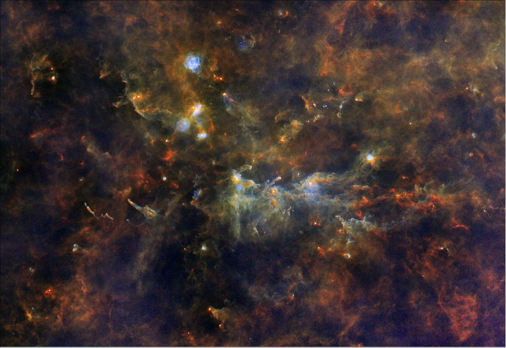Figure 39: The image was obtained as part of Herschel’s Hi-GAL key-project. This used the infrared space observatory’s instruments to image the entire galactic plane in five different infrared wavelengths. These wavelengths reveal cold material, most of it between -220ºC and -260ºC. None of it can be seen at ordinary optical wavelengths, but this infrared view shows astronomers a surprising amount of structure in the cloud’s interior. The surprise is that the Hi-GAL survey has revealed a spider’s web of filaments that stretches across the star-forming regions of our Galaxy. Part of this vast network can be seen in this image as a filigree of red and orange threads (image credit: ESA/Herschel/PACS, SPIRE/Hi-GAL Project)
