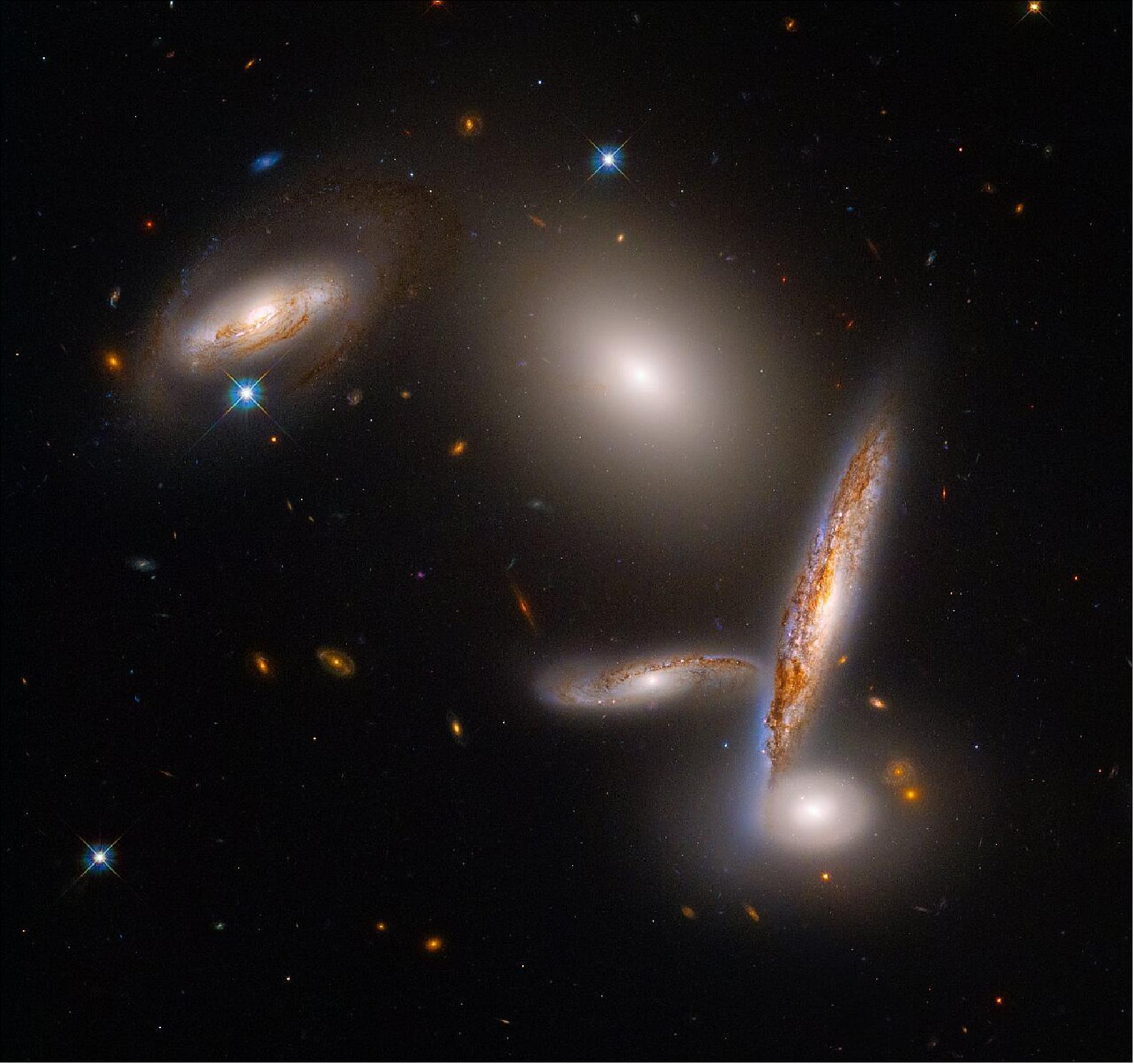 Figure 52: The NASA/ESA Hubble Space Telescope is celebrating its 32nd birthday with a stunning look at an unusual close-knit collection of five galaxies, called the Hickson Compact Group 40. This snapshot reflects a special moment in their lifetimes as they fall together before they merge (image credit: NASA, ESA and STScI)