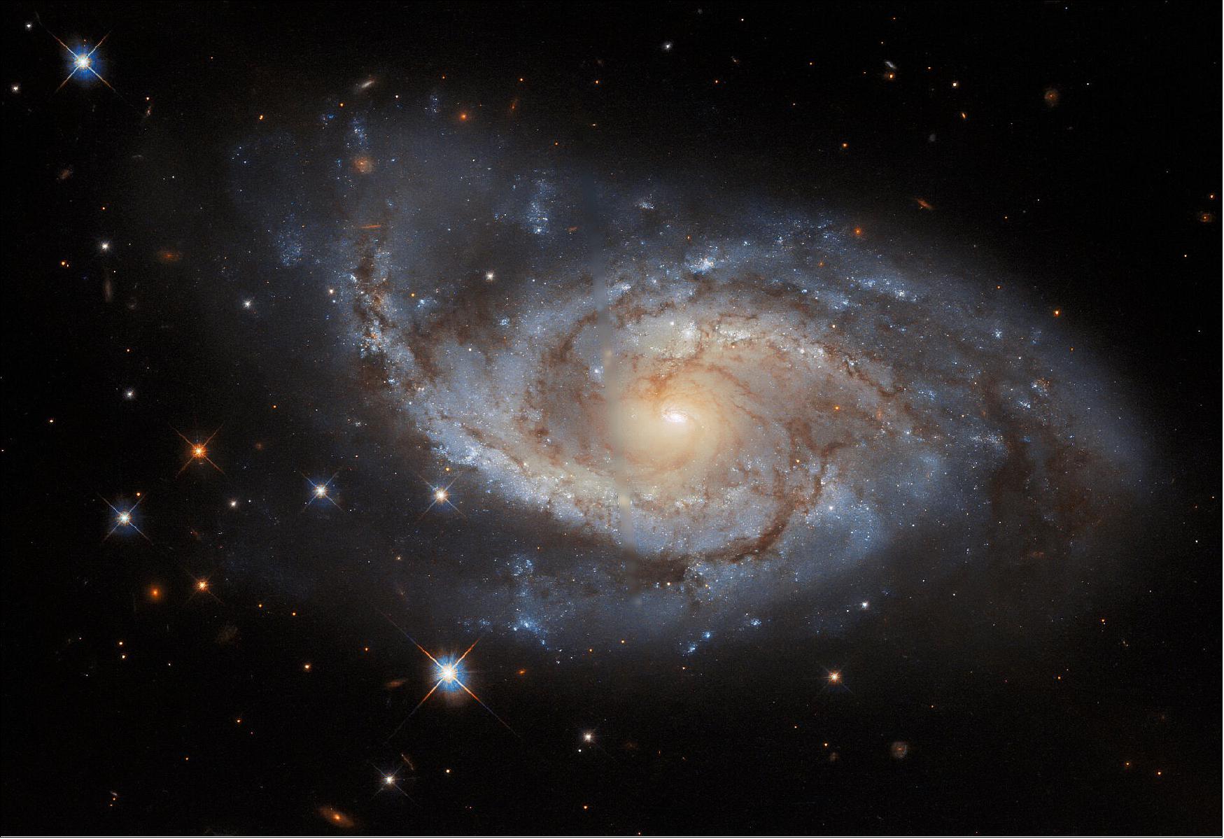 Figure 80: Despite its placid appearance, NGC 3318 has played host to a spectacularly violent astronomical phenomenon, a titanic supernova first detected by an amateur astronomer in 2000. Thanks to NGC 3318’s distance from Earth, the original supernova must have taken place in or around 1885. Coincidentally, this was the year in which the only supernova ever to be detected in our neighboring galaxy Andromeda was witnessed by 19th-century astronomers (image credit: ESA/Hubble & NASA, ESO, R. J. Foley; CC BY 4.0 Acknowledgement: R. Colombari)