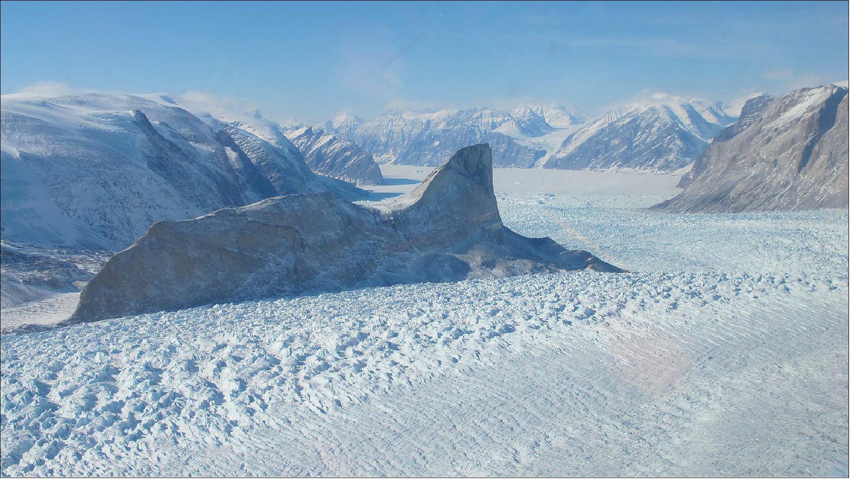 Figure 37: The Kangerdlugssup (pictured) and Jakobshavn glaciers in Greenland have lost roughly 14 to 20 feet (4 to 6 meters) of elevation per year over the past 16 years (image credit: NASA, Jim Yungel)