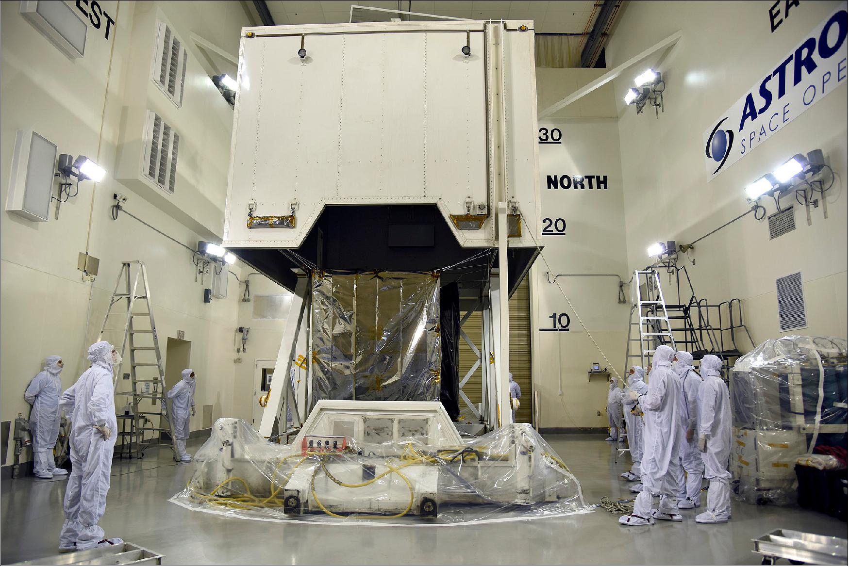 Figure 4: ICESat-2 is uncrated inside the airlock of the Astrotech processing facility at Vandenberg Air Force Base in California, prior to a successful series of tests of the satellite and its instrument (image credit: USAF 30th Space Wing/Vanessa Valentine)