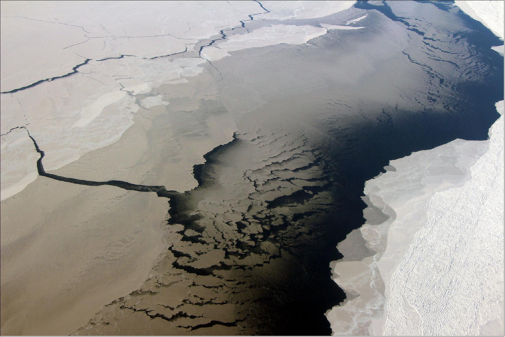 Figure 71: A coastal polynya, or opening in the sea ice cover, near the Filchner Ice Shelf in Antarctica, as seen during an Operation IceBridge flight on 10 October 2018 (image credit: NASA/John Sonntag)