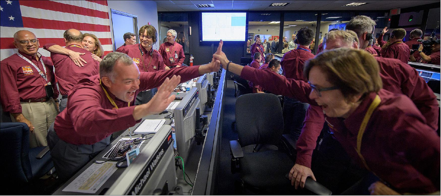 Figure 54: Tom Hoffman, InSight Project Manager, NASA JPL, left, and Sue Smrekar, InSight deputy principal investigator, NASA JPL, react after receiving confirmation that the Mars InSight lander successfully touched down on the surface of Mars, Monday, Nov. 26, 2018 inside the Mission Support Area at NASA's Jet Propulsion Laboratory in Pasadena, California (image credit: NASA, Bill Ingalls)