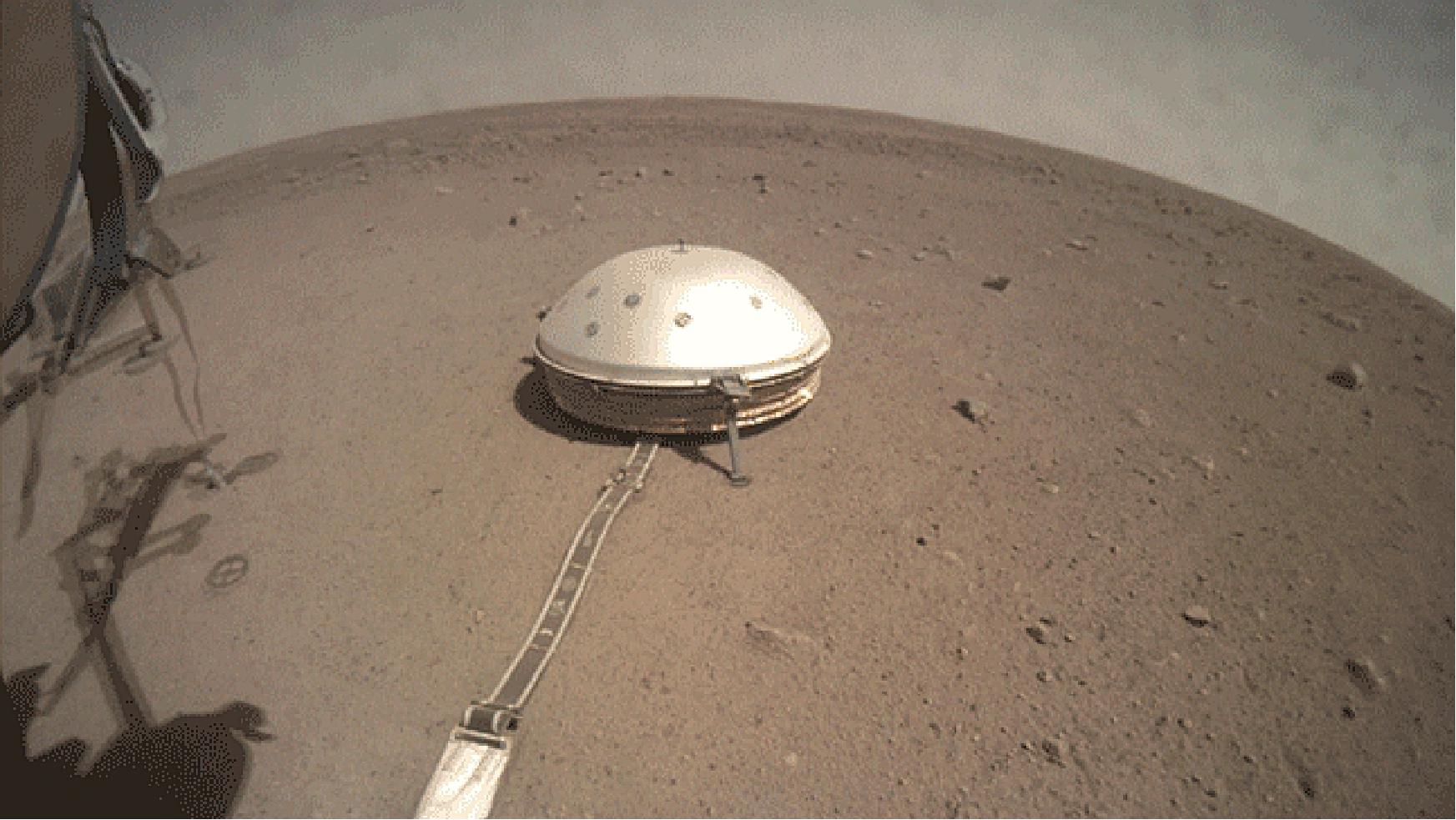 Figure 41: On 28 June 2019, NASA's InSight lander used its robotic arm to move the support structure for its digging instrument, informally called the "mole." This view was captured by the fisheye Instrument Context Camera under the lander's deck (image credit: NASA/JPL- Caltech)