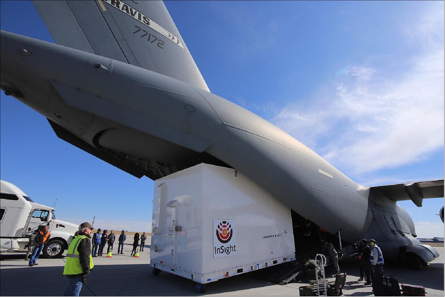 Figure 7: Personnel supporting NASA's InSight mission to Mars load the crated InSight spacecraft into a C-17 cargo aircraft at Buckley Air Force Base, Denver, for shipment to Vandenberg Air Force Base, California (image credit: NASA/JPL)