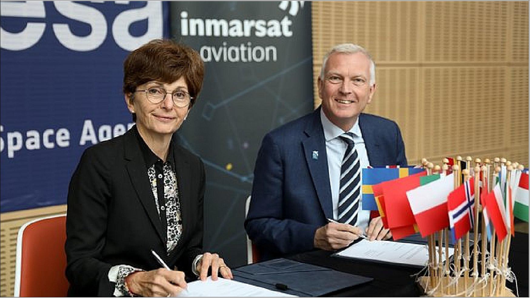 Figure 6: Magali Vaissiere, Director of Telecommunications and Integrated Applications at ESA, and Phil Balaam, President of Inmarsat Aviation, sign an agreement to put satellite-based data communication links terminals on up to 20 aircraft flying commercial services across continental Europe (image credit: ESA)