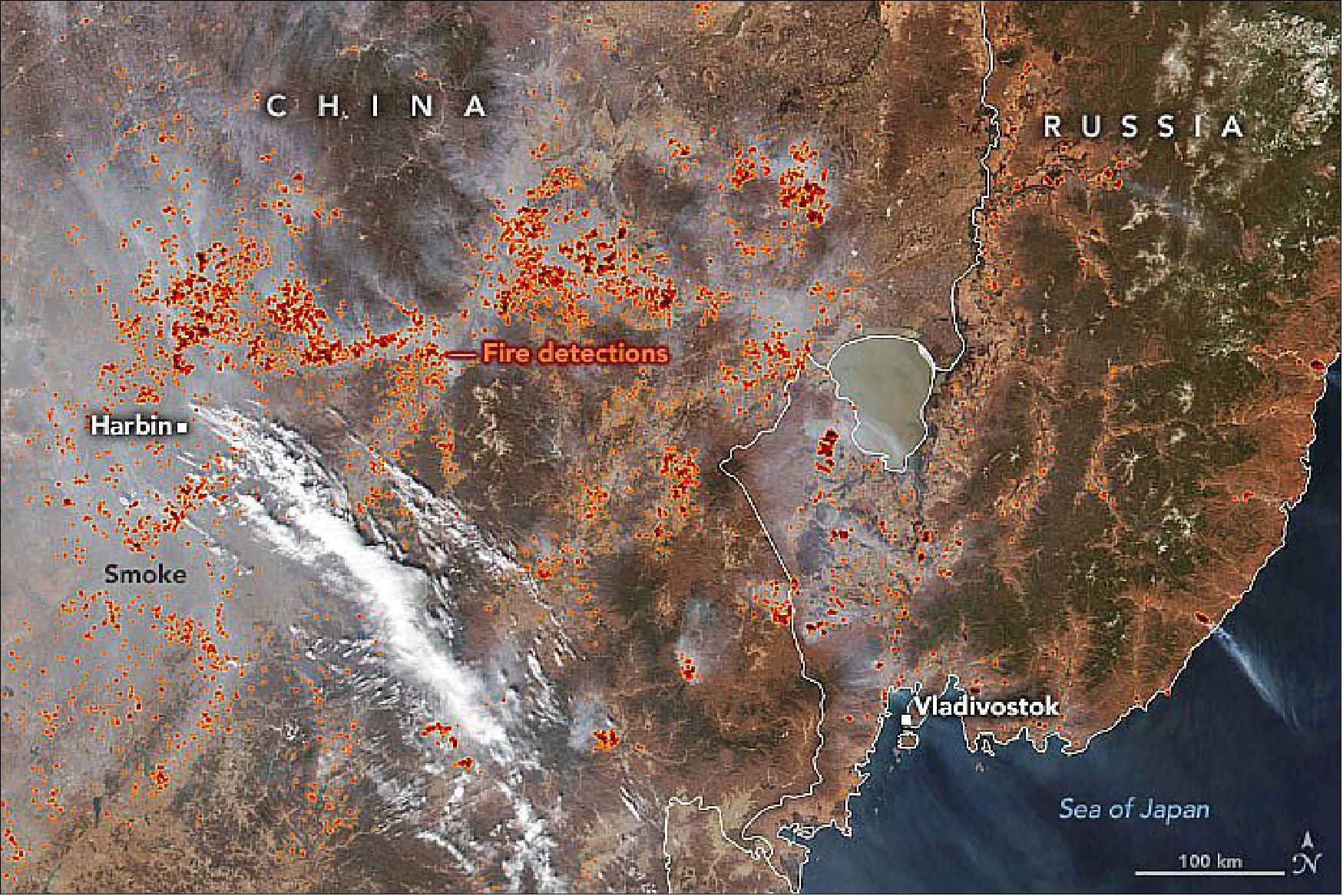 Figure 30: Many farmers in northeastern China and eastern Russia use fire to clear fields and get them ready for planting. This practice sometimes leads to hazy, smoke-filled skies, as shown by this natural-color satellite image from the Visible Infrared Imaging Radiometer Suite (VIIRS) on the NOAA-NASA Suomi NPP satellite. Throughout the spring, VIIRS has detected large numbers of “hotspots” associated with fires. These hotspots appear red and orange in this image (image credit: NASA Earth Observatory image by Joshua Stevens, using VIIRS data from NASA EOSDIS LANCE, GIBS/Worldview, and the Joint Polar Satellite System (JPSS). Story by Adam Voiland)