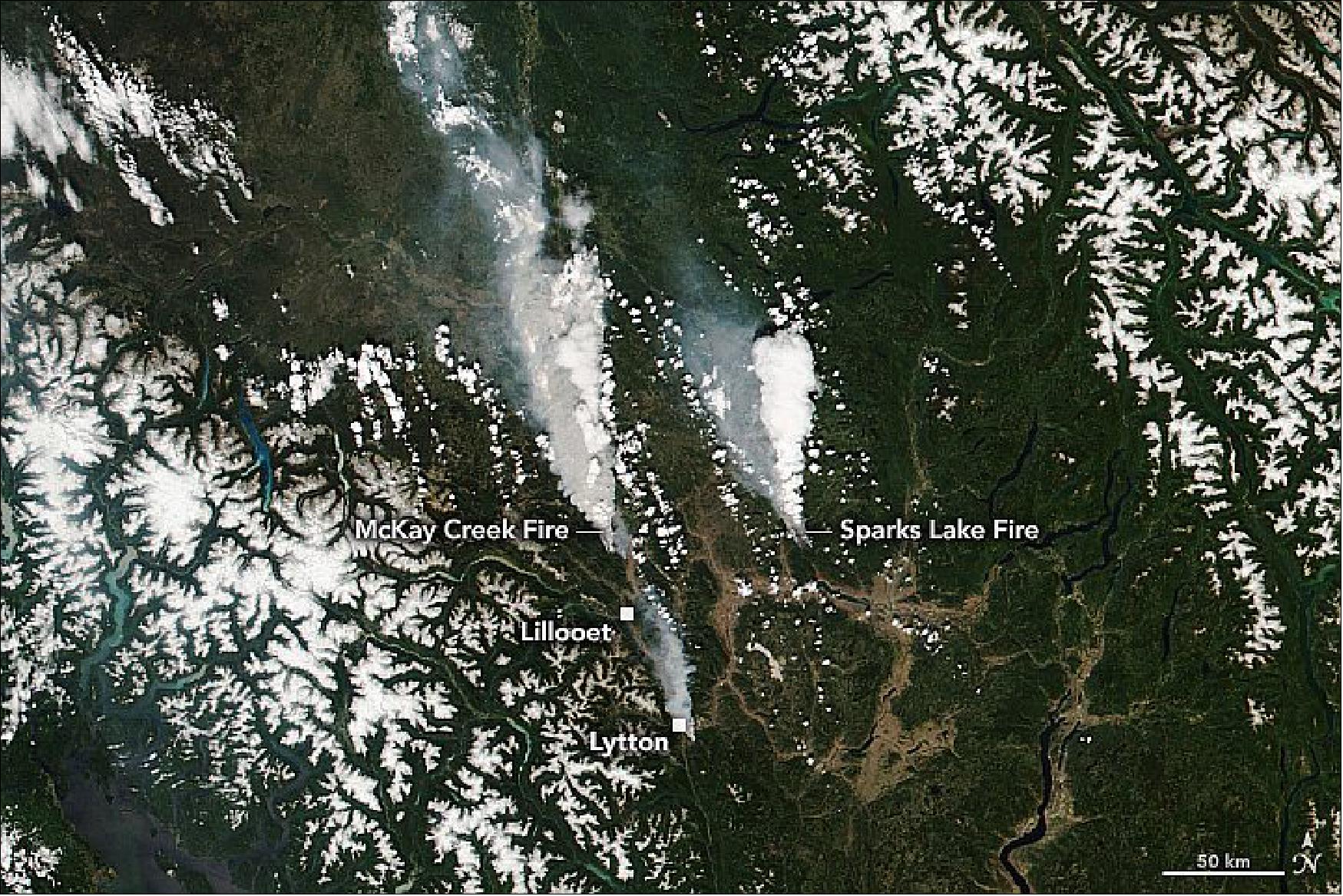Figure 27: VIIRS (Visible Infrared Imaging Radiometer Suite) on the NOAA-20 satellite acquired this image around 2 p.m. local time (21:00 Universal Time) on June 30, 2021. By the morning of July 1, the McKay Creek fire (left) and the Sparks Lake fire (right) had burned an estimated 150 and 200 km2 (60 and 75 square miles), respectively. A smaller fire is visible just south of the town of Lytton (image credit: NASA Earth Observatory images by Lauren Dauphin and Joshua Stevens, using VIIRS data from NASA EOSDIS LANCE, GIBS/Worldview, and the Suomi National Polar-orbiting Partnership, Landsat data from the U.S. Geological Survey, and GEOS-5 data from the Global Modeling and Assimilation Office at NASA GSFC. Story by Kathryn Hansen)