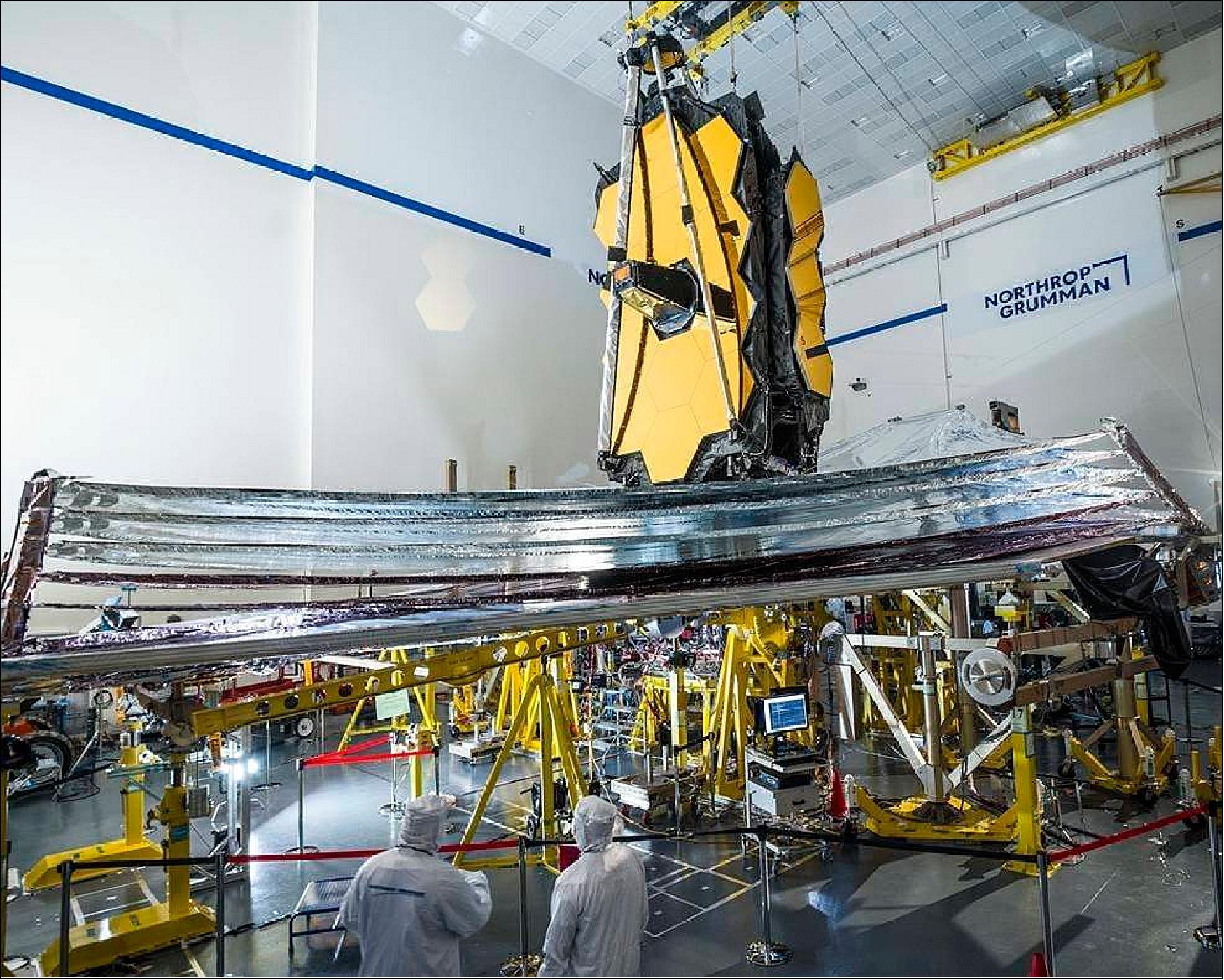 Figure 38: On Jan. 4, 2022, engineers successfully completed the deployment of the James Webb Space Telescope's sunshield, seen here during its final deployment test on Earth in December 2020 at Northrop Grumman in Redondo Beach, California. The five-layer, tennis court-sized sunshield is essential for protecting the telescope from heat, allowing Webb's instruments to cool down to the extremely low temperatures necessary to carry out its science goals (image credits: NASA/Chris Gunn)