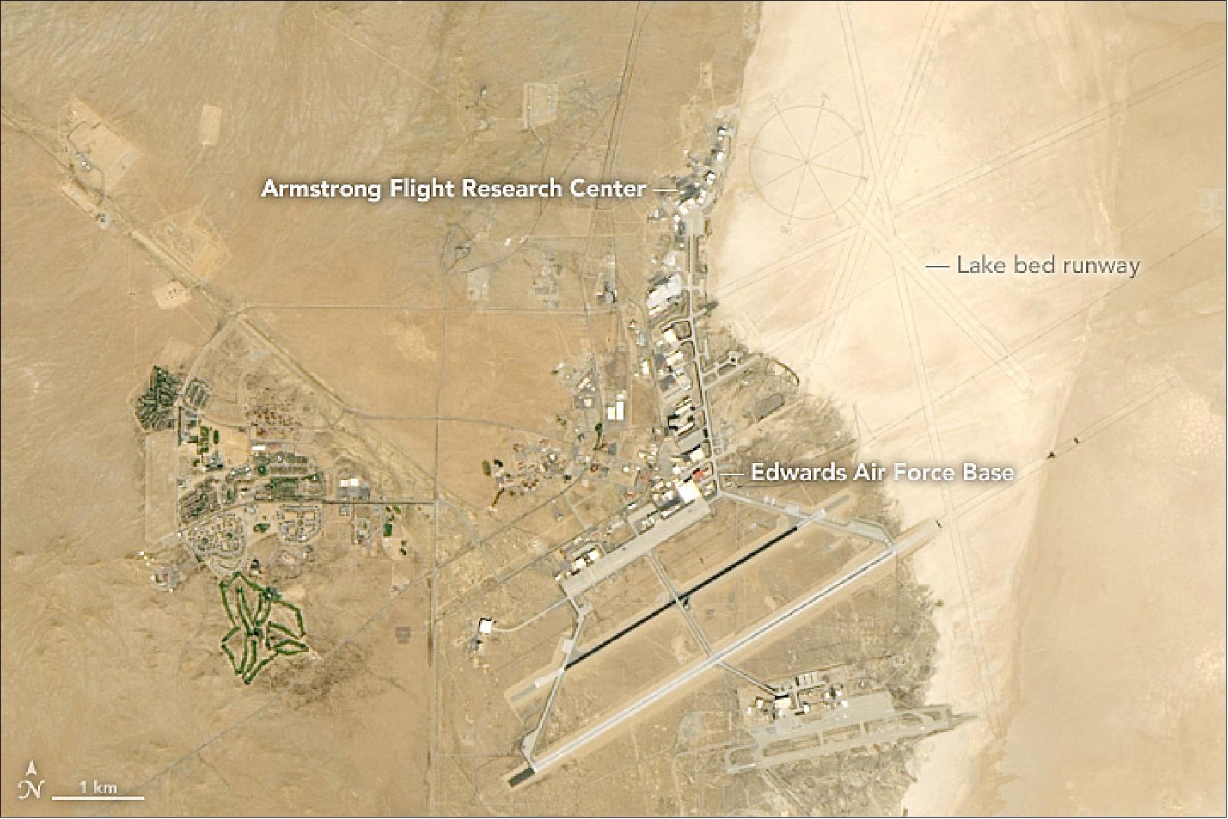 Figure 86: OLI on Landsat-8 captured this image of Edwards Air Force Base and Armstrong Flight Research Center on October 18, 2018. The image showcases the world’s largest compass rose, which was placed there to help pilots land even if navigational equipment fails. Several “drawn on” runways are also visible crisscrossing the surface of the dry lake. The main concrete runway at Edwards Air Force Base, in combination with the lakebed, offers pilots one of the longest and safest runways in the world (image credit: NASA Earth Observatory, images by Lauren Dauphin, using Landsat data from the U.S. Geological Survey. Story by Adam Voiland)