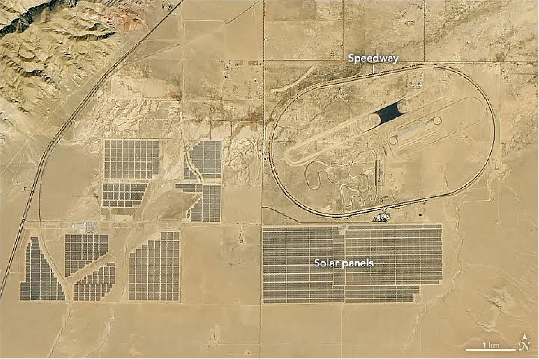 Figure 55: Surrounded by solar panels, engineers test automobiles, motorcycles, and ATVs at speeds up to 320 km/hour on the winding roads of the Honda Proving Center (below). The prison (Figure 51), which used to hold people detained by U.S. immigration officials, now houses 2,300 inmates from California (image credit: NASA Earth Observatory, image by Lauren Dauphin, using Landsat data, observed on 18 October 2018, from the U.S. Geological Survey. Story by Adam Voiland)