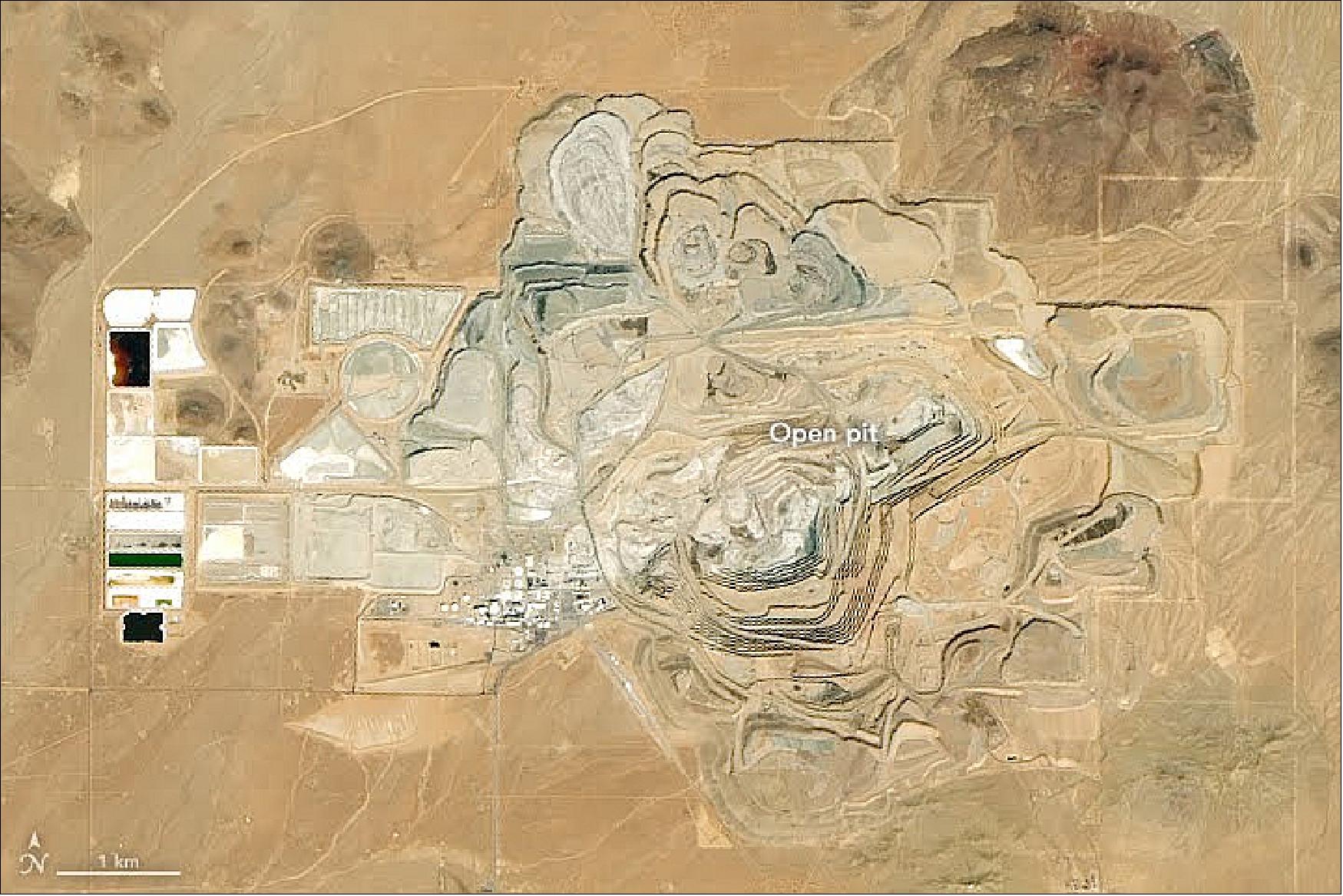 Figure 54: The borax mine is California’s largest open-pit mine, producing about half of the world’s refined borates. Borates are used in fertilizers, in metallurgy, and as components of specialized types of glass, anticorrosive coatings, fire retardants, and detergents (image credit: NASA Earth Observatory, image by Lauren Dauphin, using Landsat data, observed on 18 October 2018, from the U.S. Geological Survey. Story by Adam Voiland)