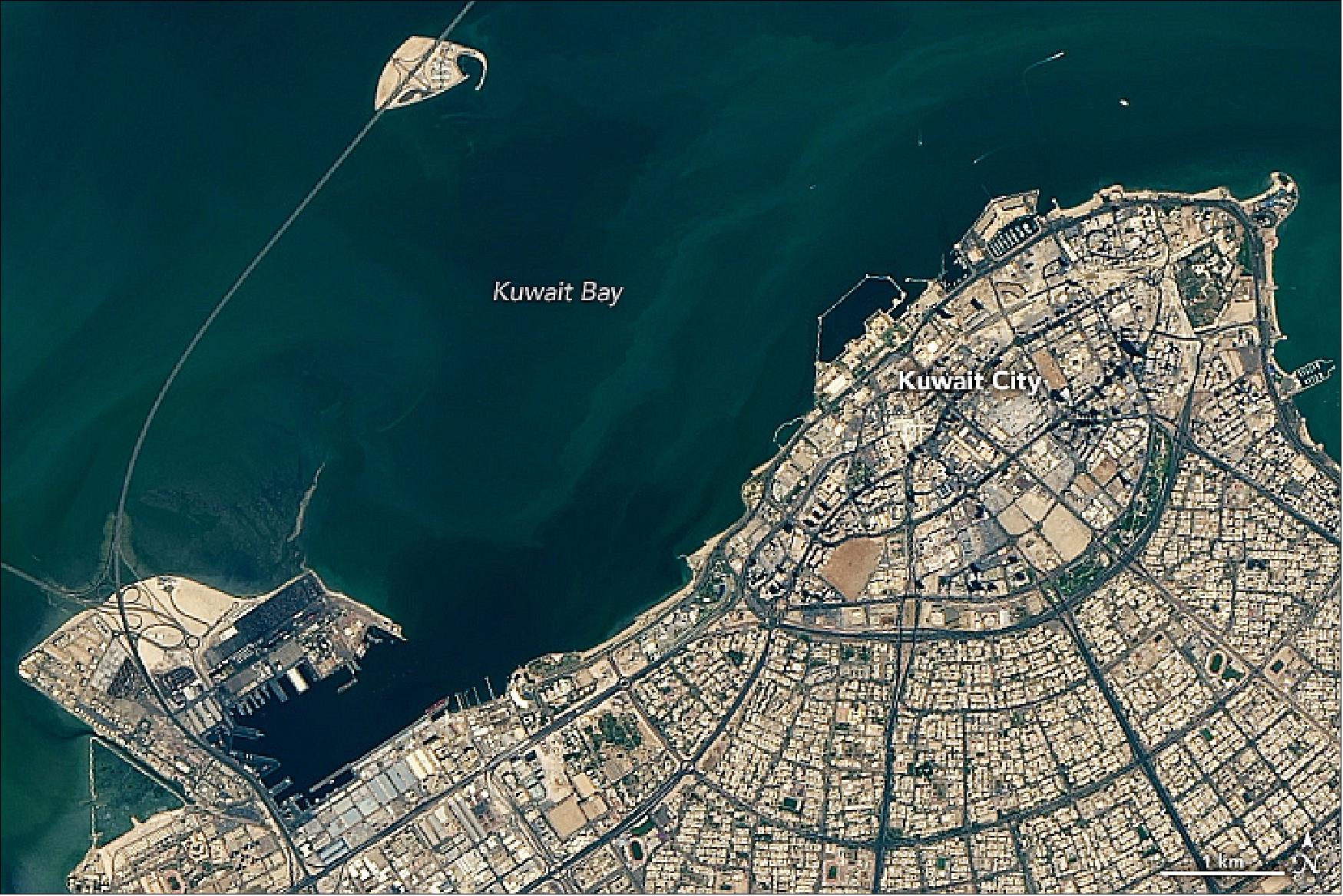 Figure 31: Detail image of Landsat-8 of Kuwait City and the Sheikh Jaber Al-Ahmad Al-Sabah Causeway with Bay Island South (image credit: NASA Earth Observatory, image by Lauren Dauphin, using Landsat data from the U.S. Geological Survey. Story by Kasha Patel)