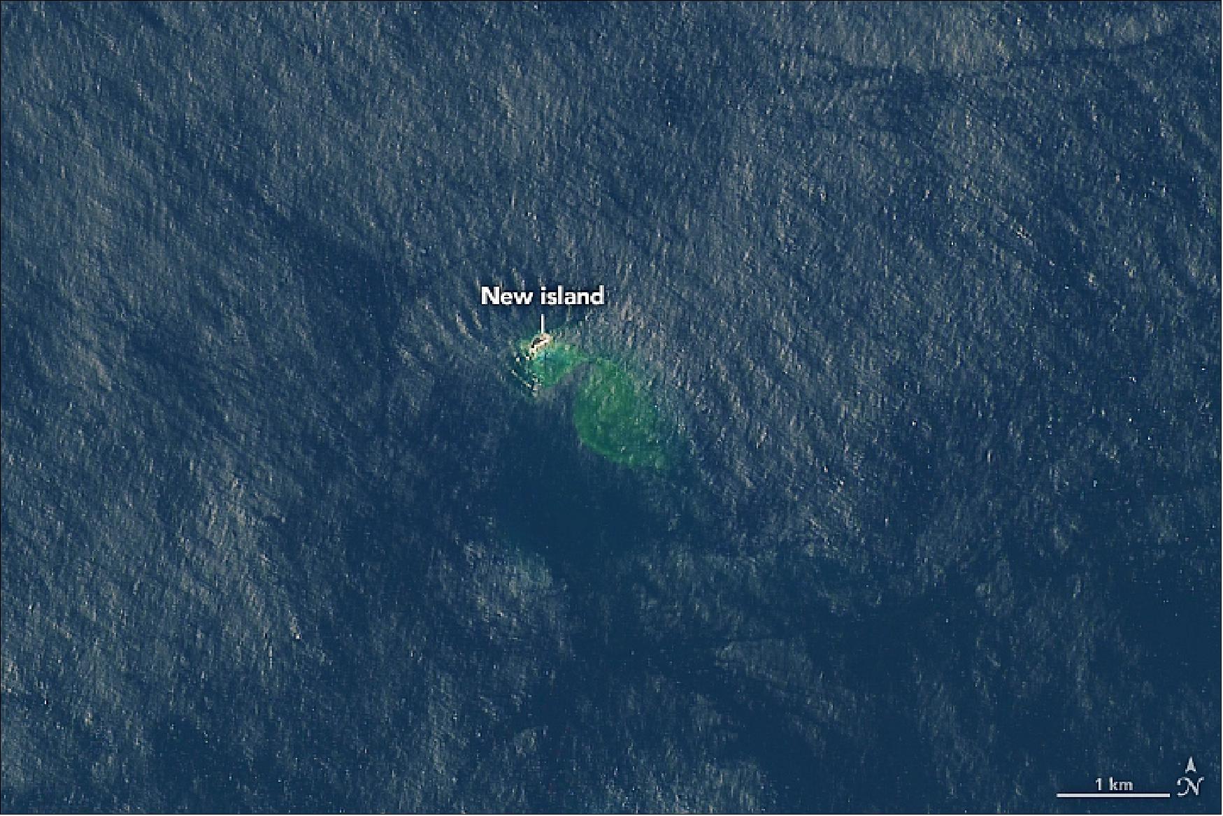 Figure 13: When the plume cleared on November 1, satellites started getting clear views of the new land that had emerged. Landsat-8 acquired the second, natural-color image of Lateiki Island on 17 November. Note that water around the island was still discolored from the eruption’s emissions. The new island measures about 400 meters (1300 feet) long and 100 meters (300 feet) wide (image credit: NASA Earth Observatory, image by Lauren Dauphin, using Landsat data from the U.S. Geological Survey. Story by Kathryn Hansen)