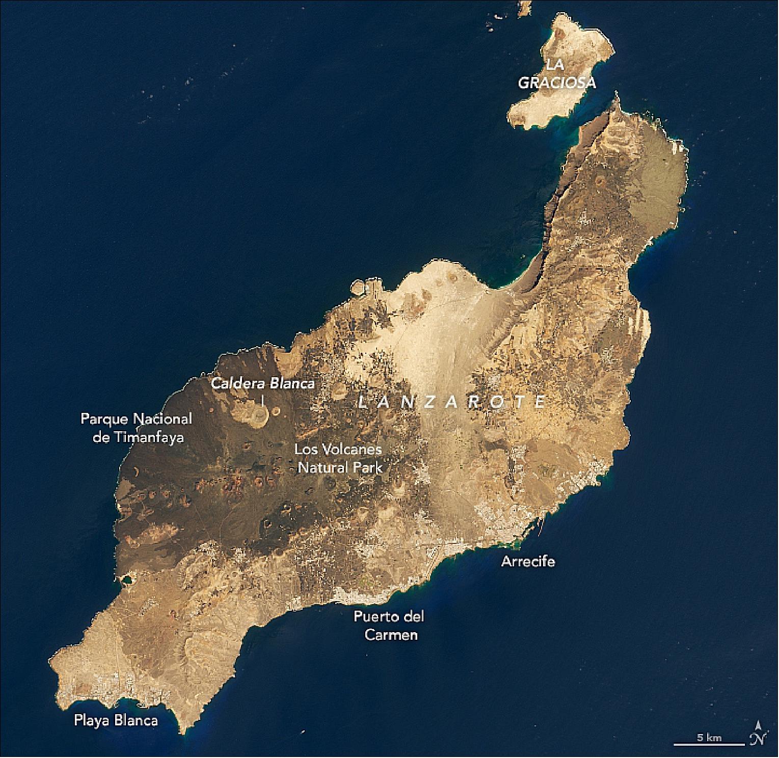 Figure 3: Overview of the Canary Island of Lanzarote, acquired with OLI on Landsat-8 on 2 October 2019 (image credit: NASA Earth Observatory, image by Lauren Dauphin, using Landsat data from the U.S. Geological Survey. Story by Kathryn Hansen)