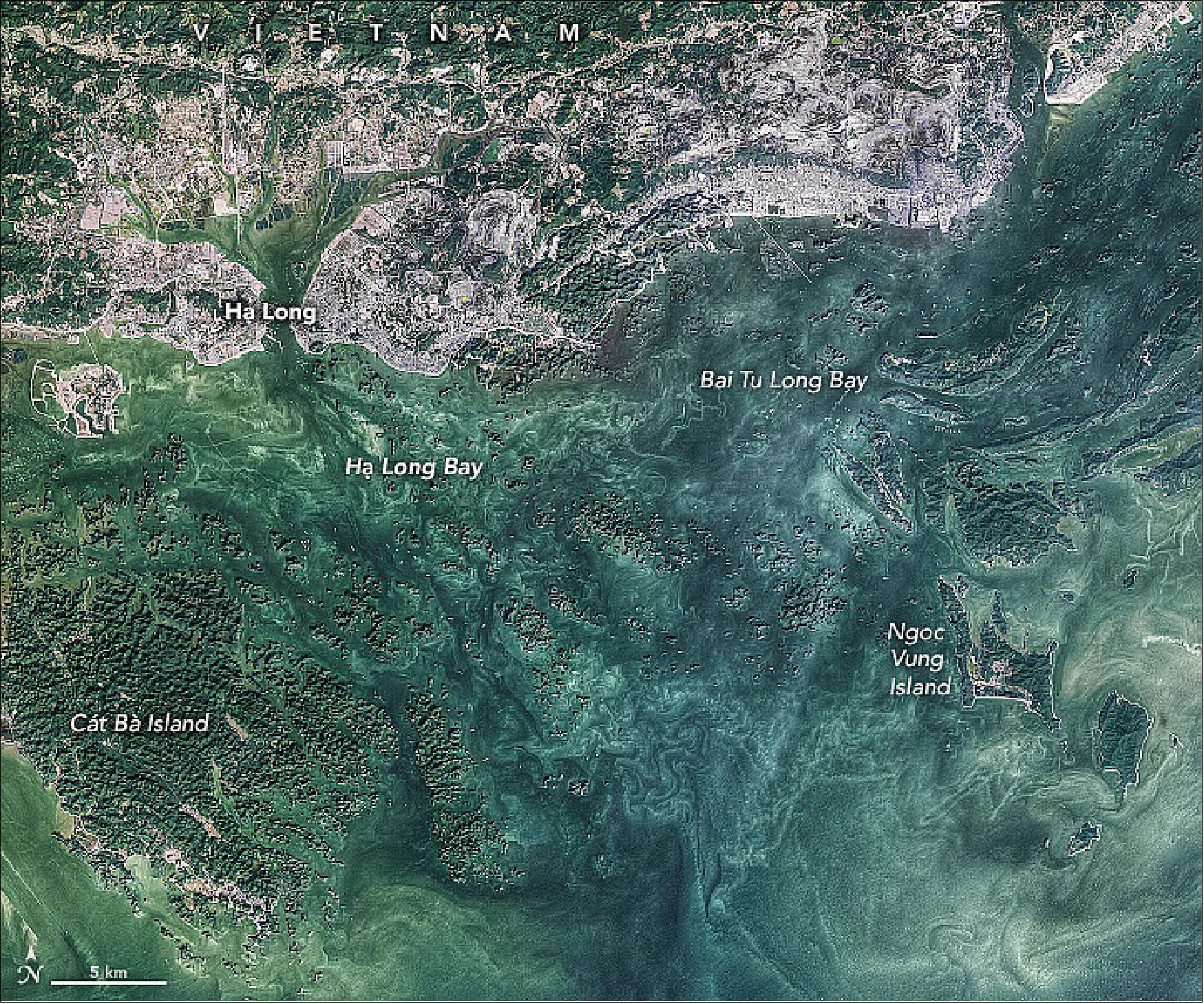 Figure 46: Ha Long Bay and nearby Bai Tu Long Bay—on the northeast coast of Vietnam, about 170 km (100 miles) east of Hanoi—are shown in the above image, which was acquired on December 1, 2021, by the Operational Land Imager (OLI) on Landsat 8.
