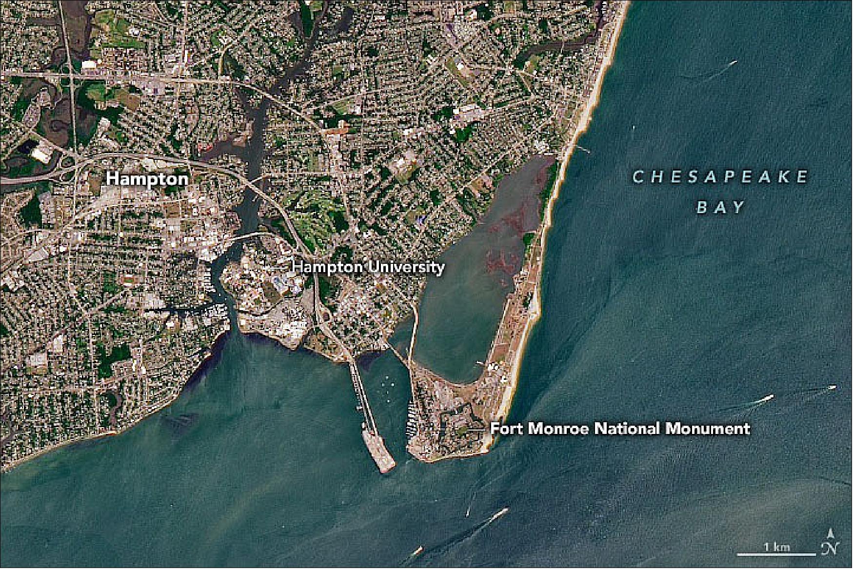 Figure 29: The OLI instrument on Landsat-8 acquired this natural-color image of Old Point Comfort on June 10, 2022. When the first landing of Africans occurred in Virginia, the peninsula was home to the small, wooden Fort Algernourne. Fort Monroe, a larger stone fortress built during the War of 1812, now occupies the spot. Parts of the moat around the hexagonal fort are visible in the Landsat image, as well as several of the six bastions. (image credit: NASA Earth Observatory image by Joshua Stevens, using Landsat data from the U.S. Geological Survey. Story by Adam Voiland)