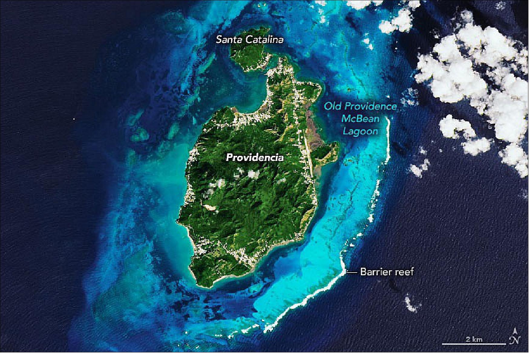 Figure 36: Once a sanctuary for pilgrims and privateers, the Caribbean island is now a refuge for a quiet Caribbean life and raw natural beauty.. Situated in the southwestern Caribbean Sea, Providencia was once an island sanctuary for pilgrims and privateers. Today, it is mostly a refuge of quieter Caribbean life amid raw natural beauty. The Operational Land Imager-2 (OLI-2) on Landsat-9 acquired this image of it on January 9, 2022 (image credit: NASA Earth Observatory image by Joshua Stevens, using Landsat data from the U.S. Geological Survey. Story by Michael Carlowicz)