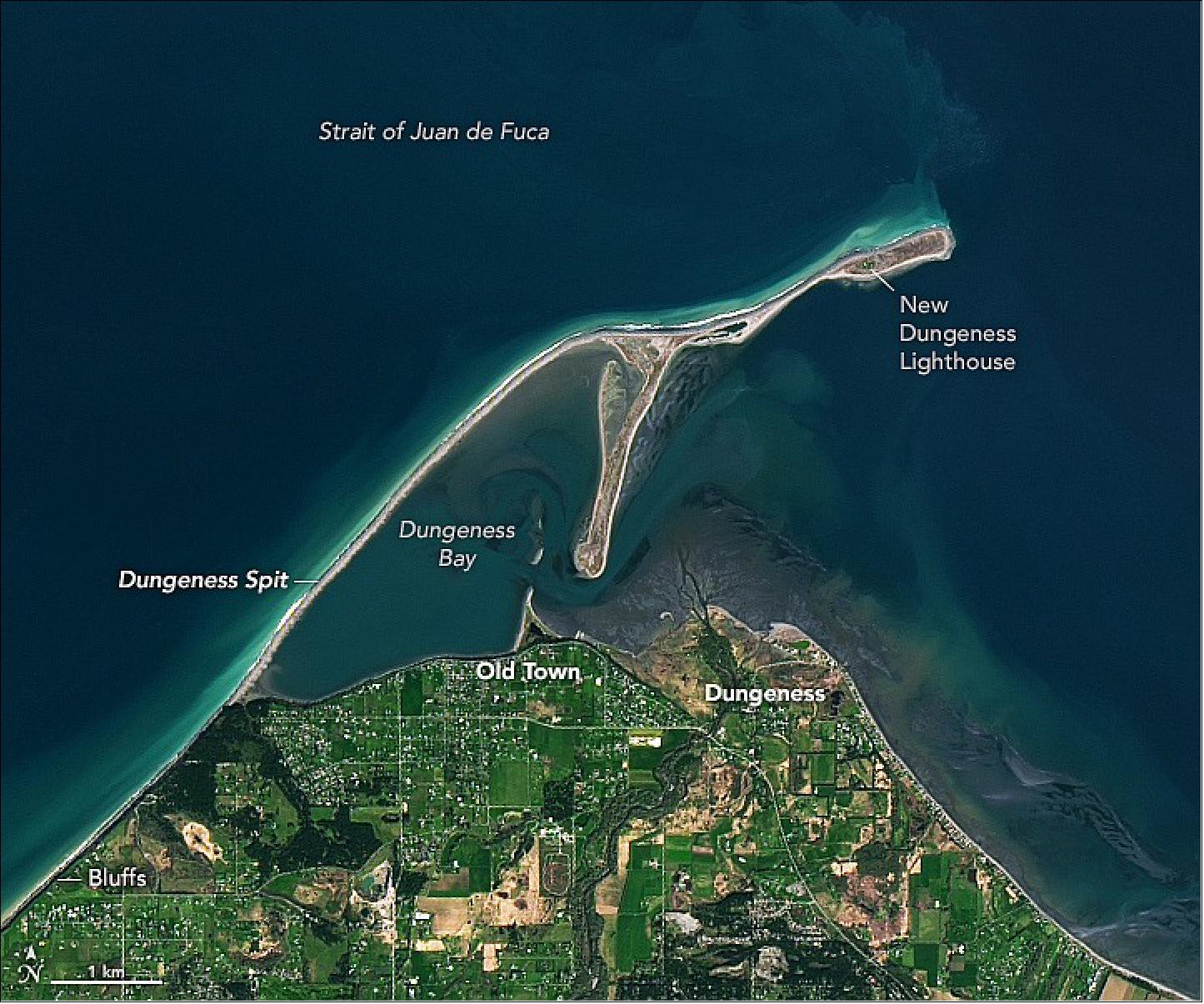 Figure 32: The town, the bay, the spit, and its lighthouse—all named Dungeness—are visible in this image, acquired on April 6, 2022, with the Operational Land Imager-2 (OLI-2) on Landsat-9. Before the arrival of Europeans, the S’Klallam indigenous people had named the spit Tsi-tsa-kwick and the bay Tses-kut. British explorer George Vancouver dubbed the area New Dungeness in 1792 because he thought it resembled the Dungeness headland in the English Channel (image credit: NASA Earth Observatory image by Lauren Dauphin, using Landsat data from the U.S. Geological Survey. Story by Kathryn Hansen)